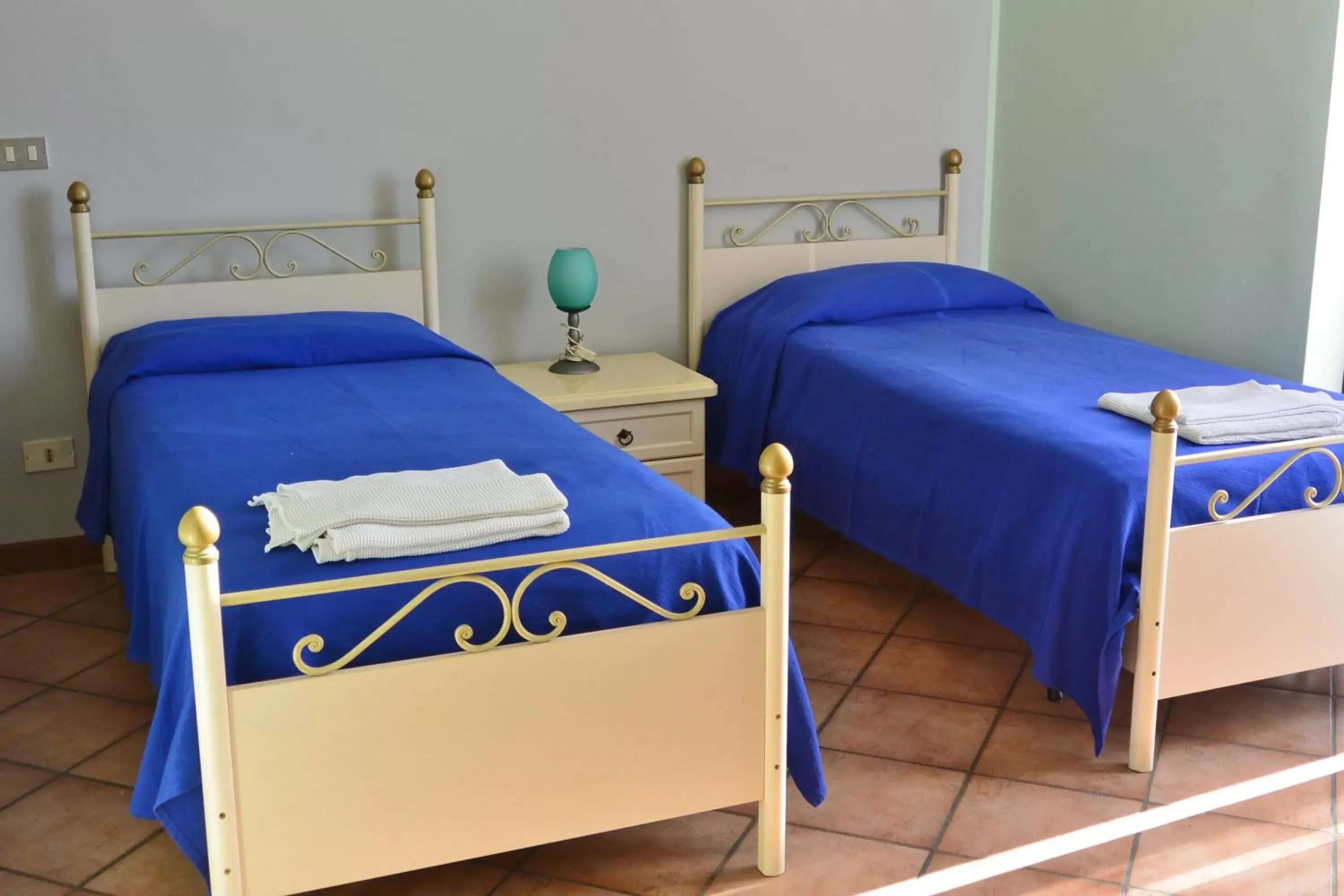 Bed in Albergo Escondido