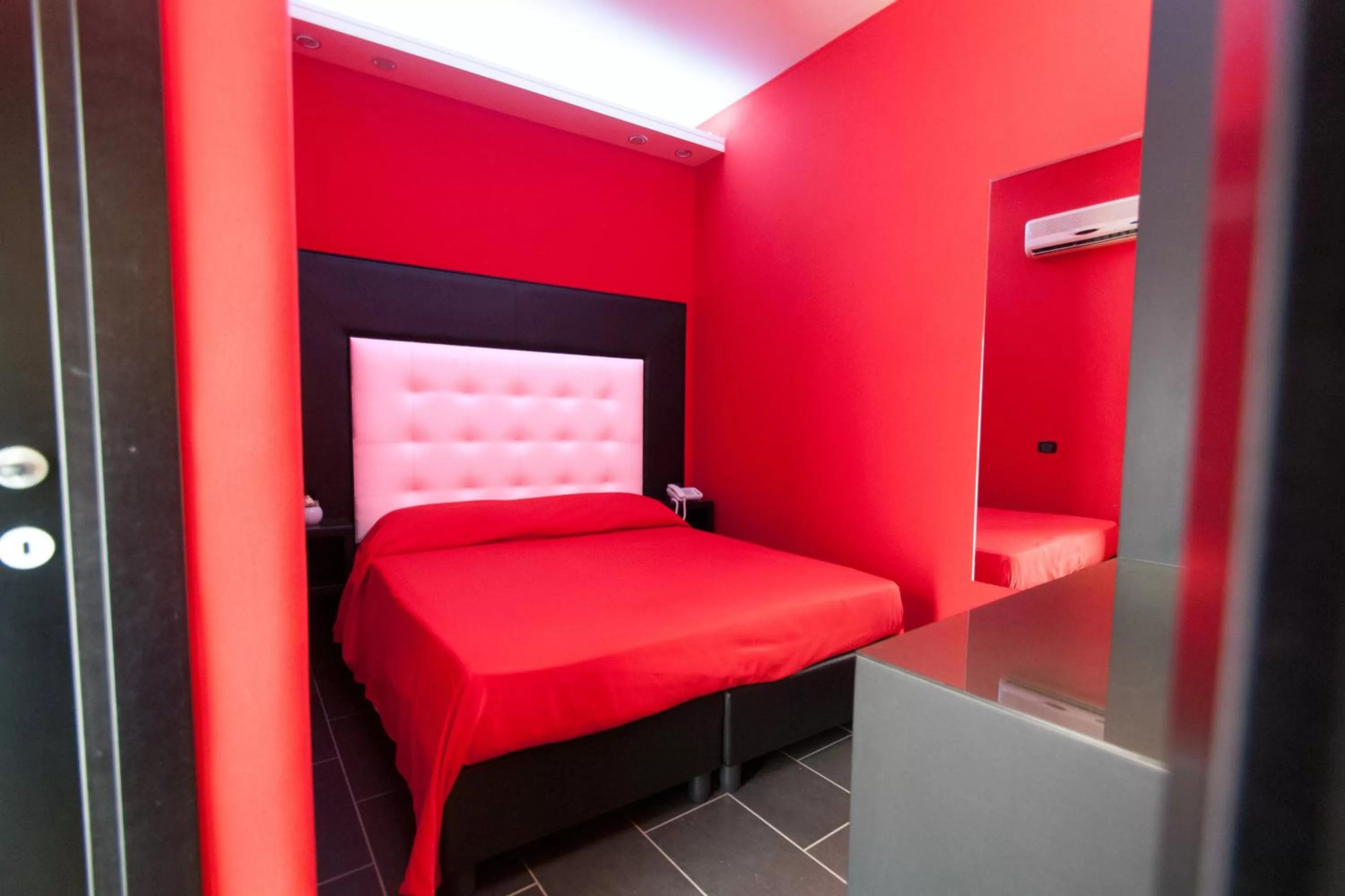 Bed in Fly Boutique Hotel