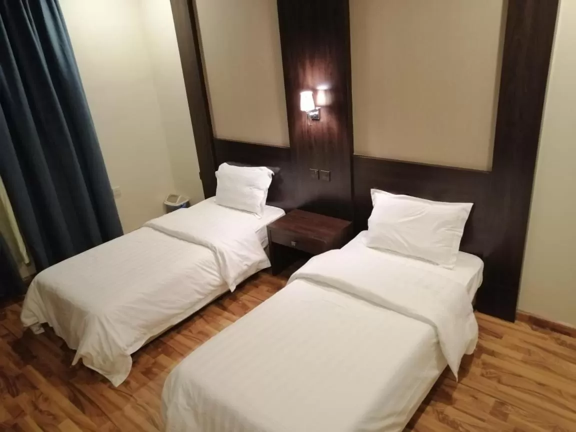 Bed in شقق درر رامه للشقق المخدومة 10