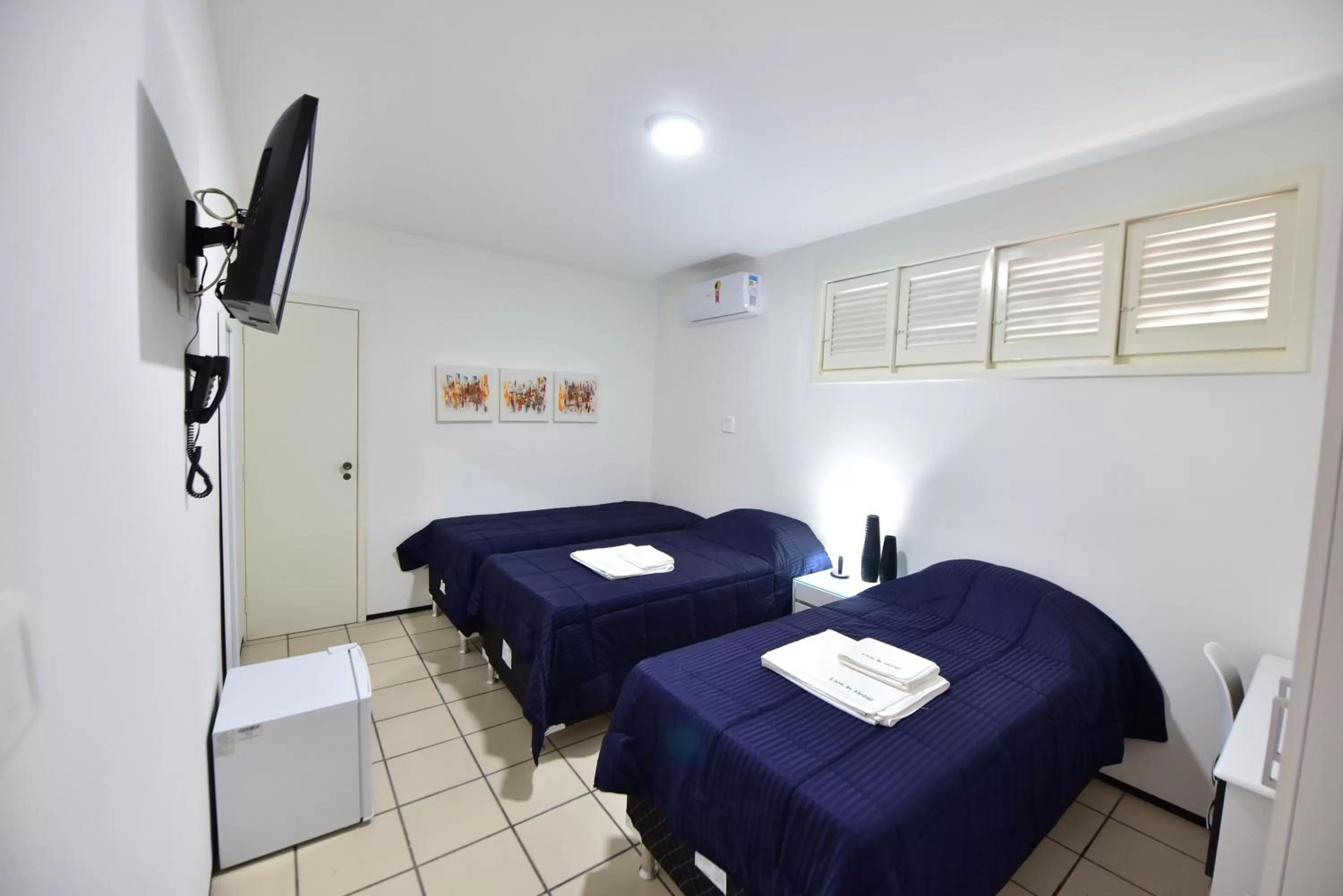 Bed in LIVE IN FORTALEZA HOTEL