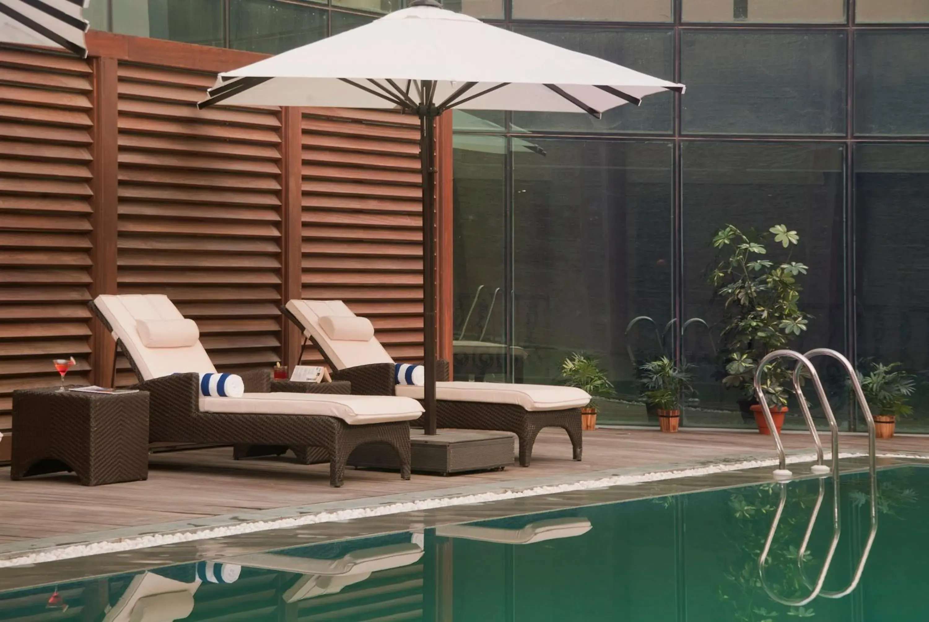 Swimming pool in Savoy Suites Greater Noida