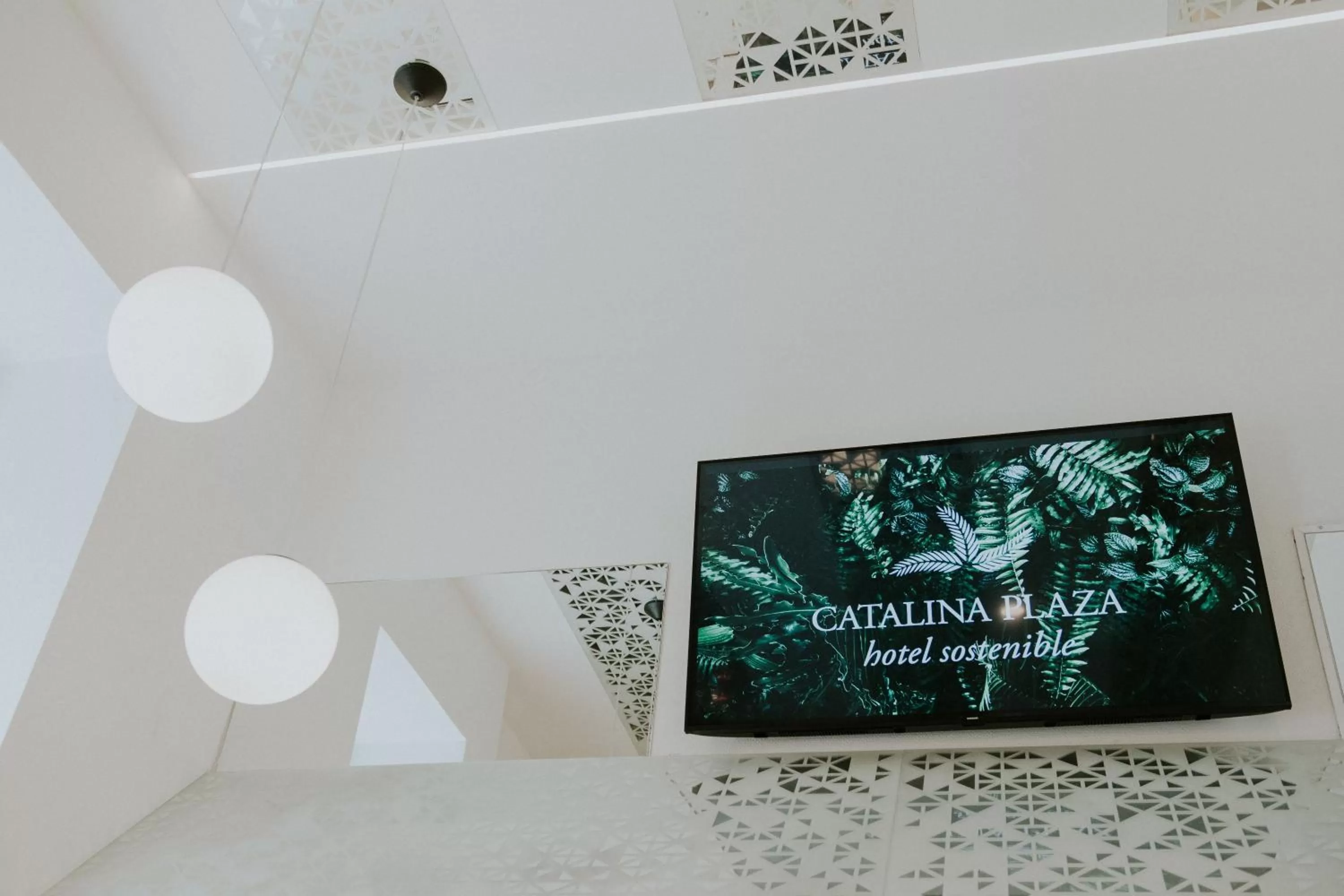 Property logo or sign in Catalina Plaza Hotel Sostenible