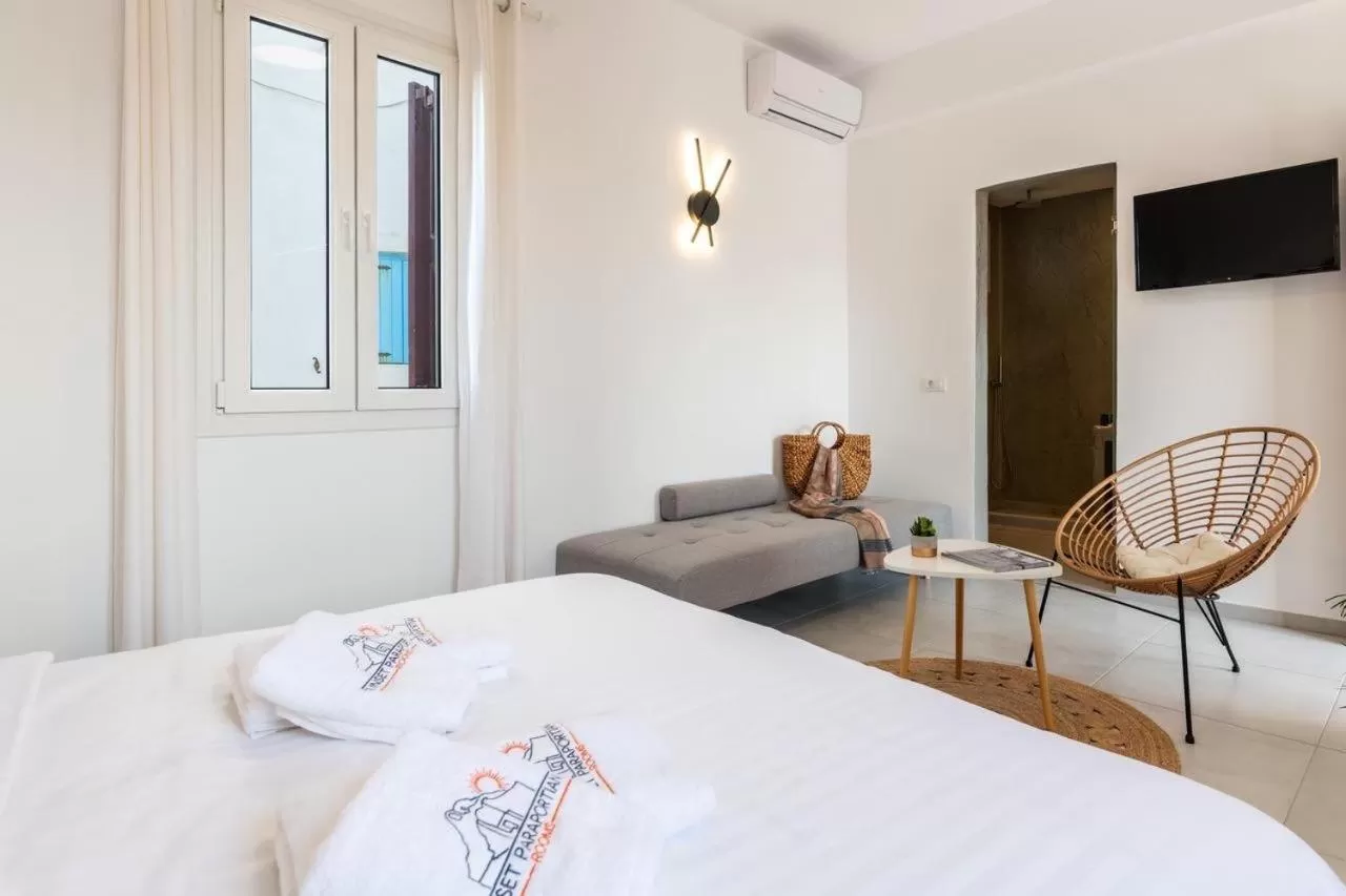 Bed in Sunset Paraportiani Rooms