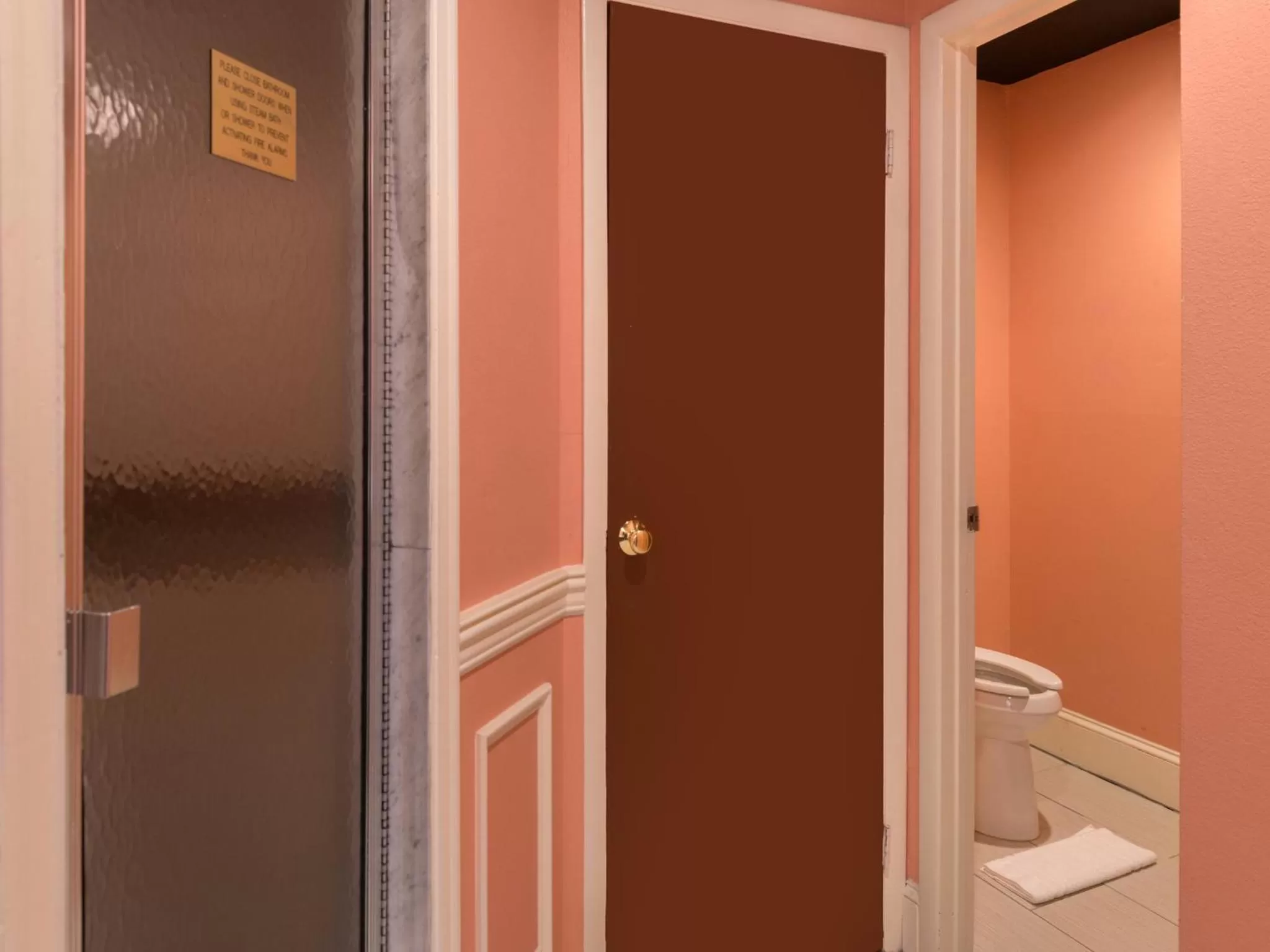 Toilet in Inn of The Dove Romantic Luxury & Business Suites