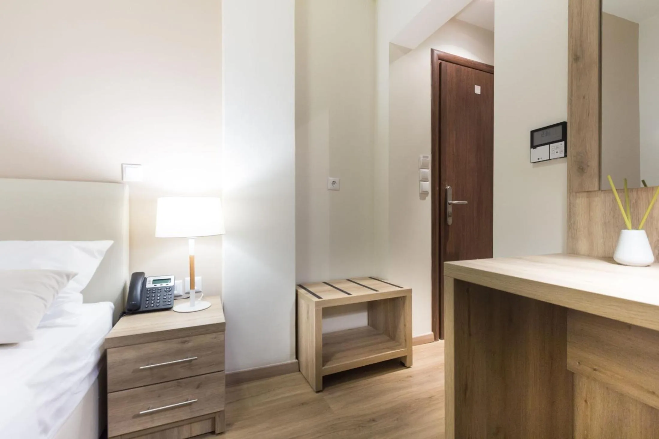 Photo of the whole room, Bed in Hotel @Syngrou Fix