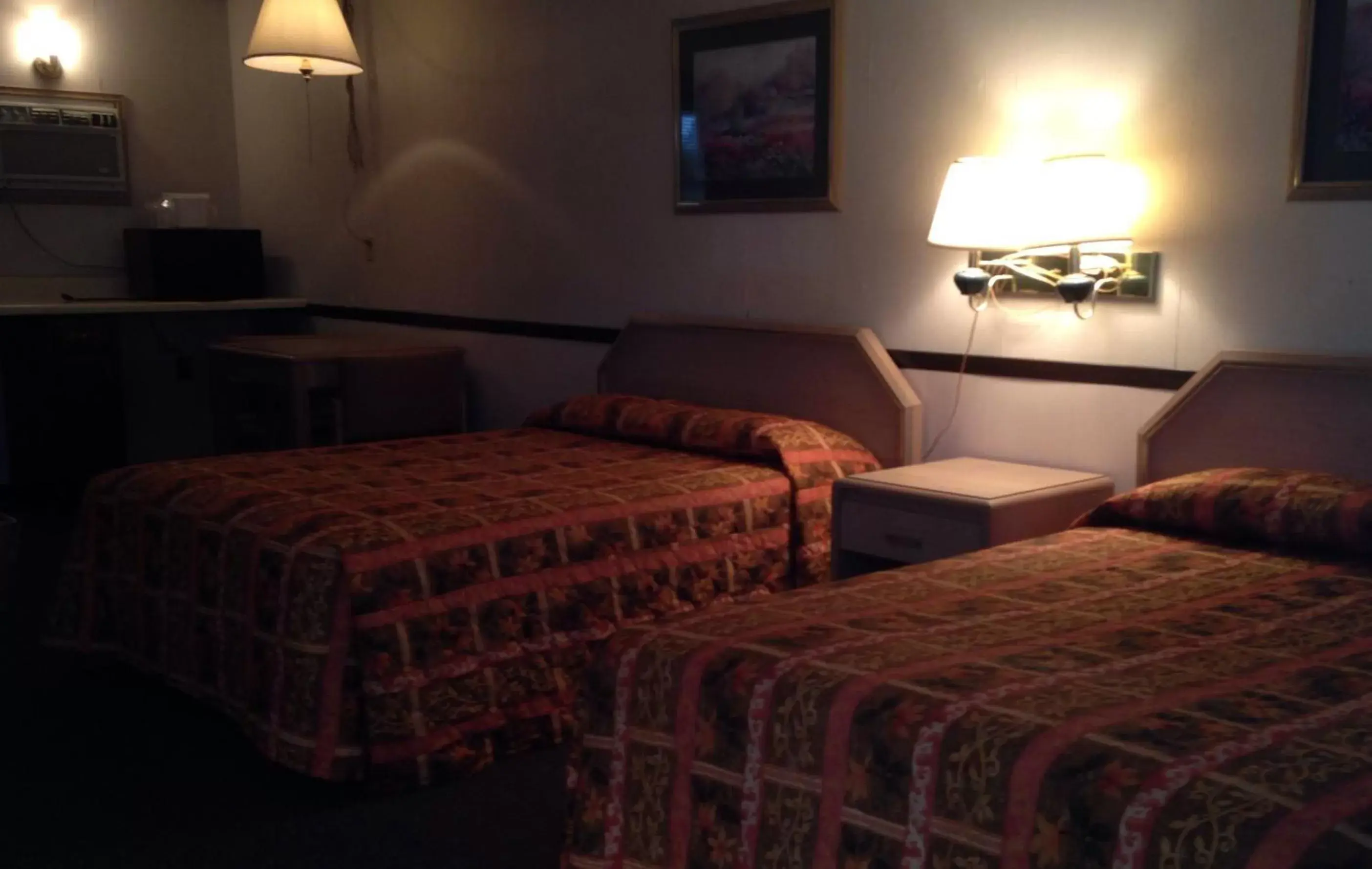 Bed in Twin Pine Motel
