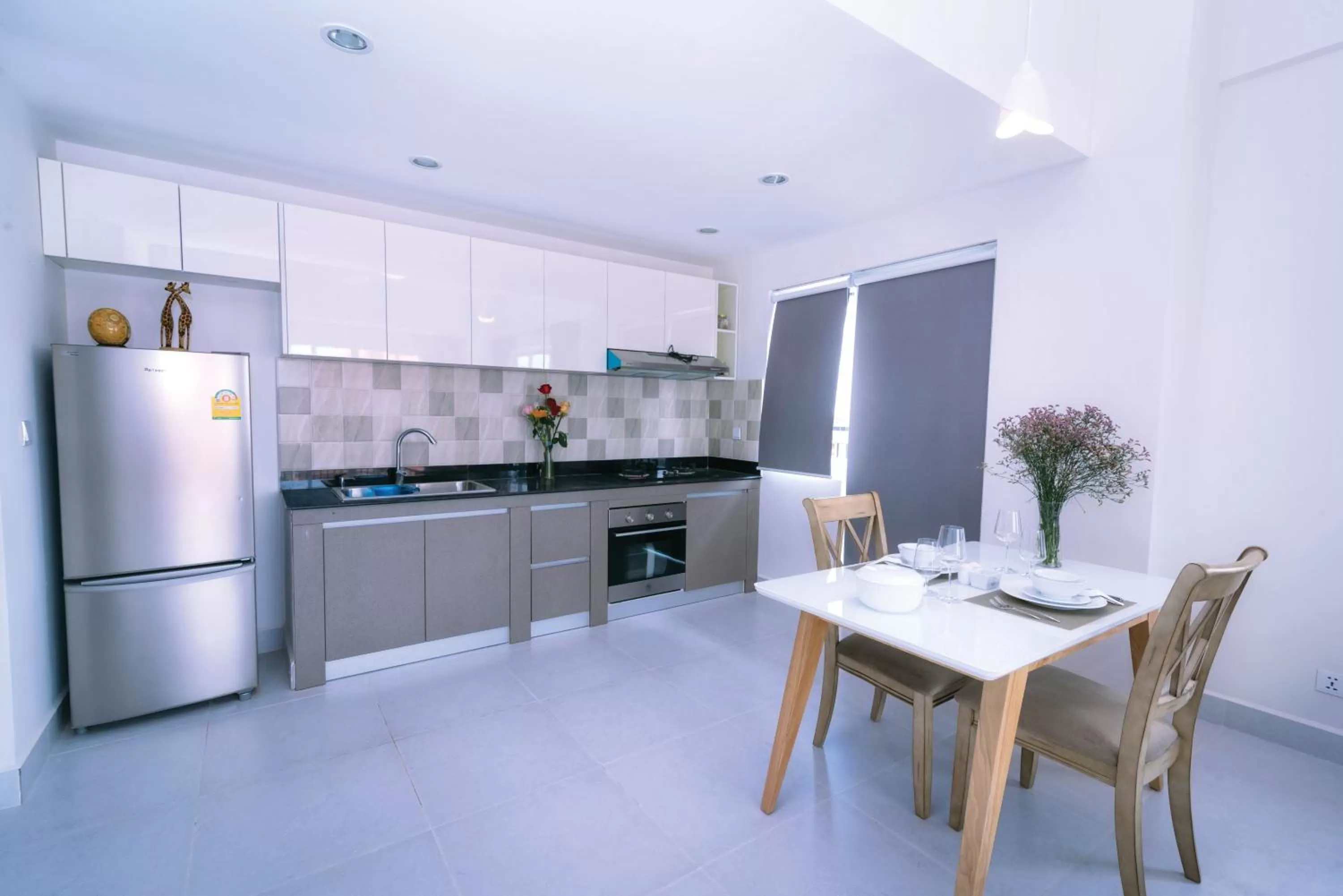 Kitchen or kitchenette in Sun Apartment