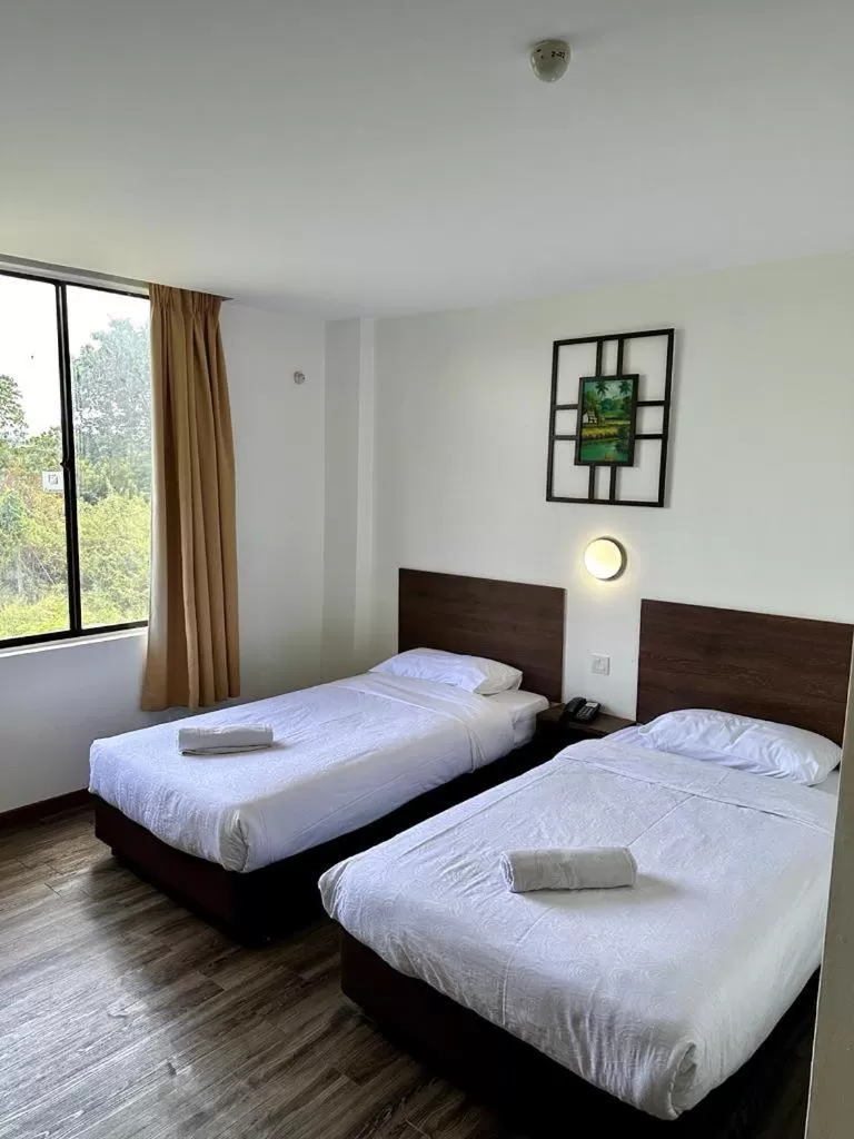 Bed in Langkawi Baron Hotel