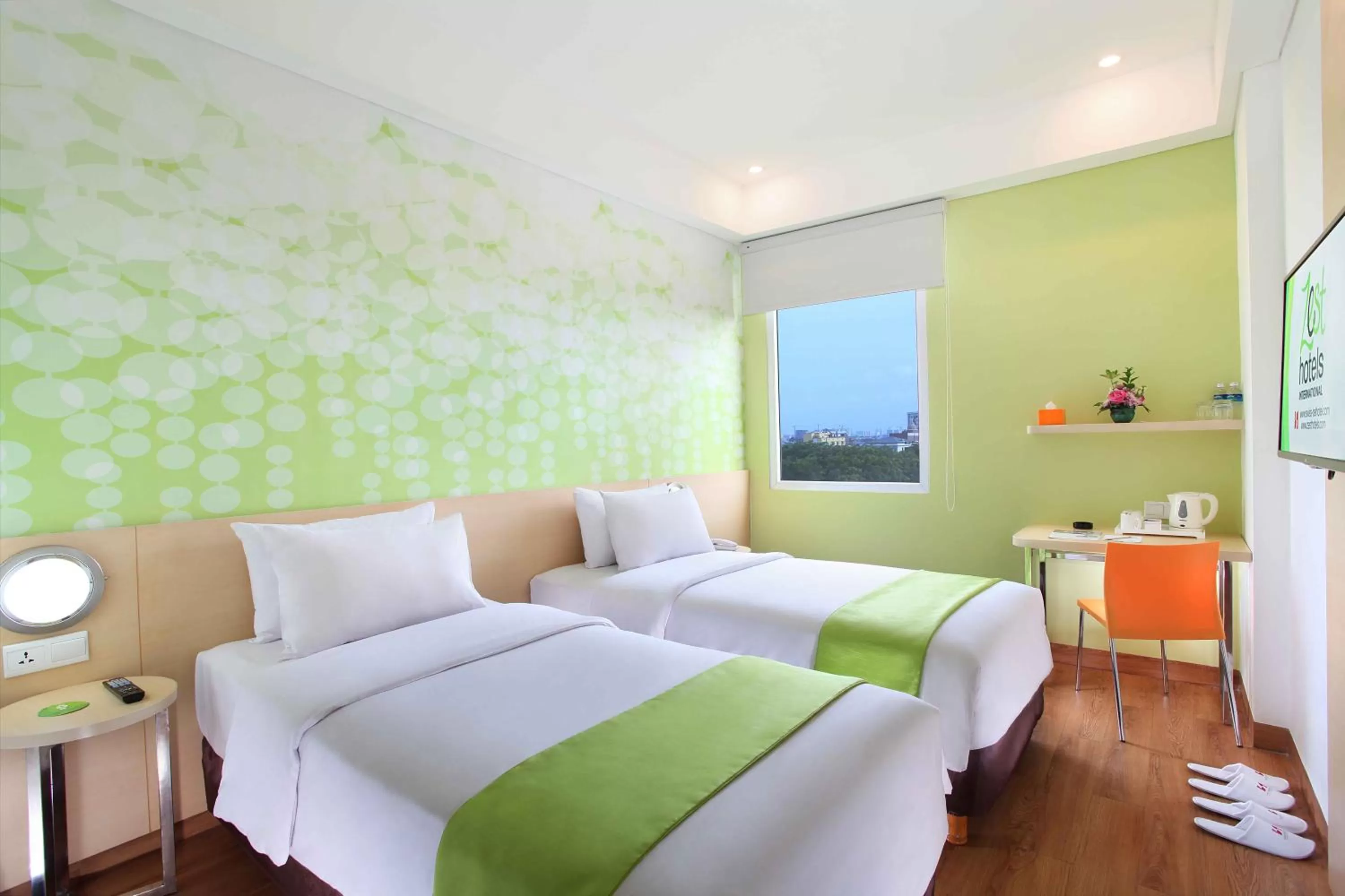 Bed in Zest Airport Jakarta by Swiss-Belhotel International