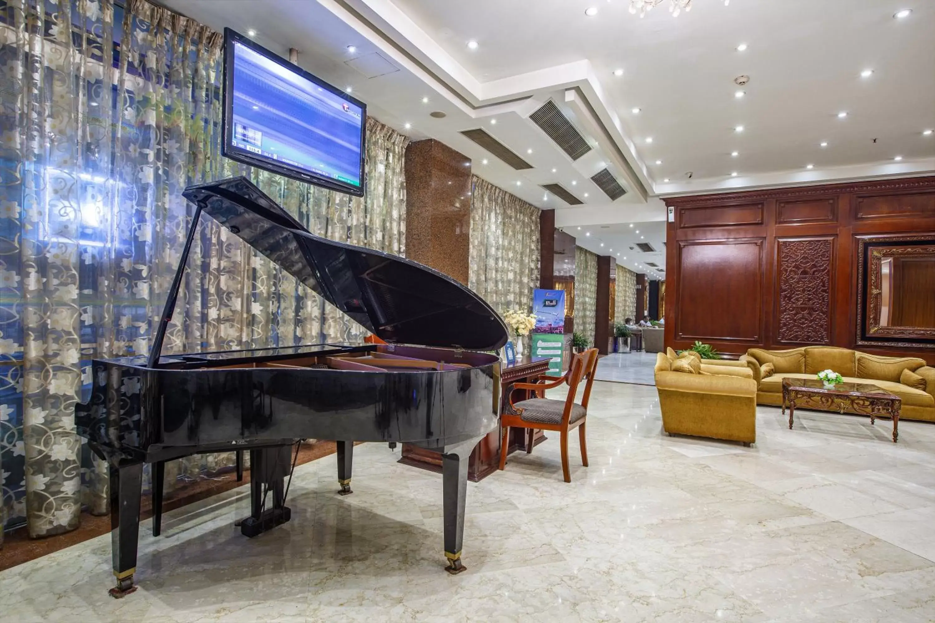 Seating area, Lobby/Reception in Hotel Sarina