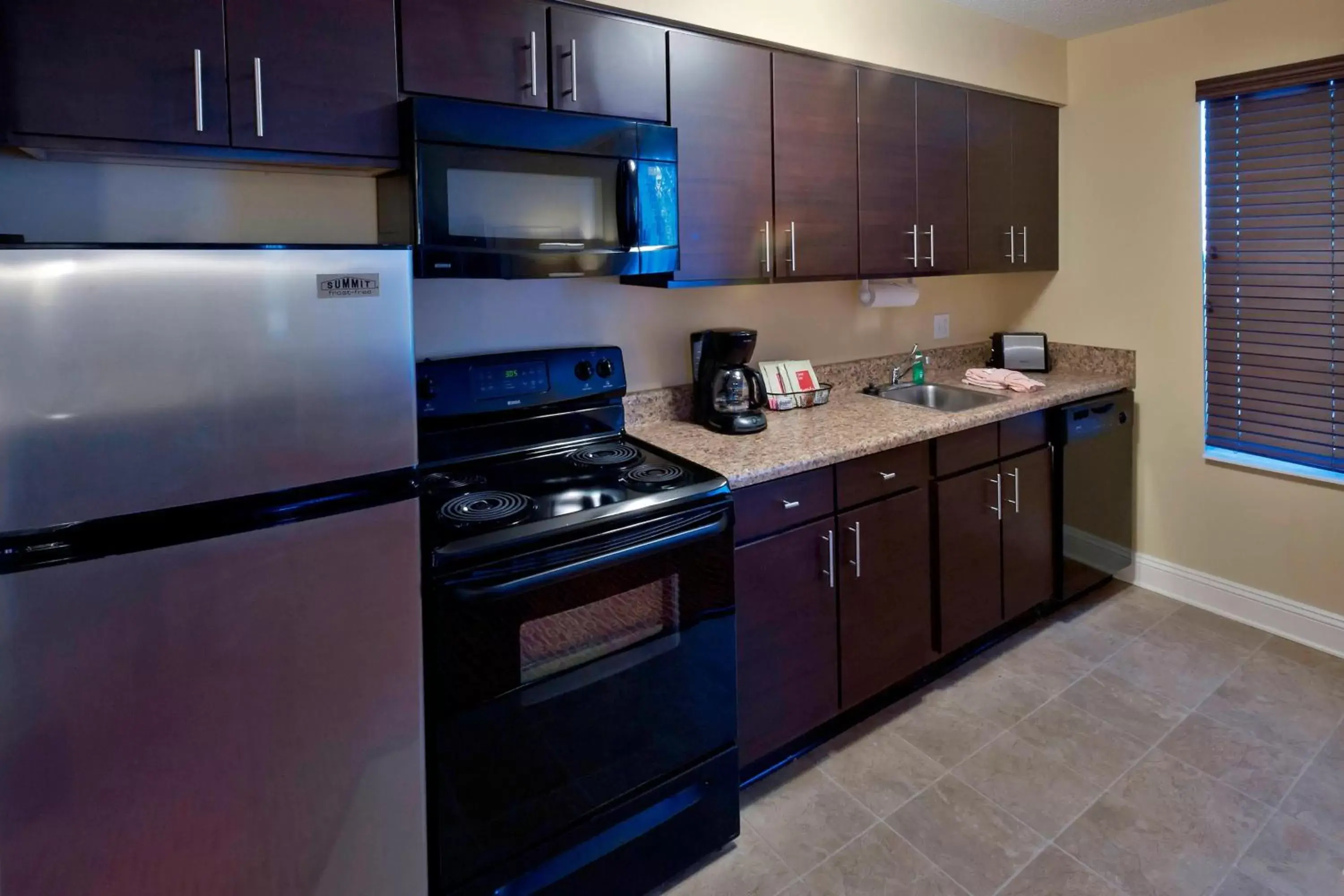 Kitchen or kitchenette, Kitchen/Kitchenette in TownePlace Suites Pensacola