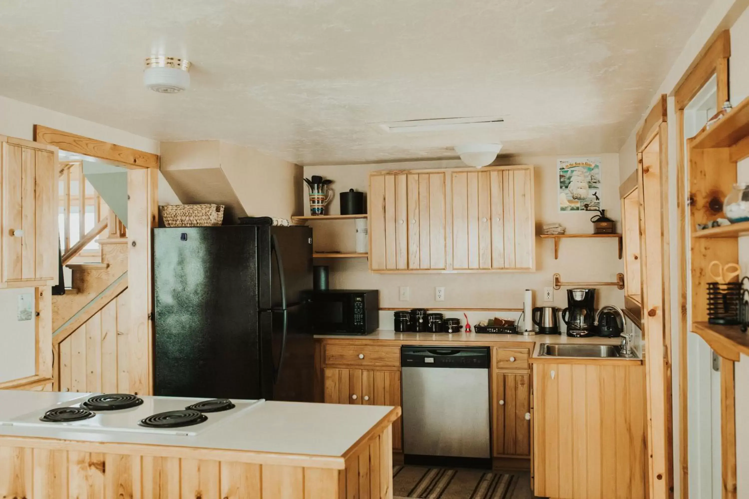 Kitchen or kitchenette, Kitchen/Kitchenette in Nye Beach Condos & Cottages
