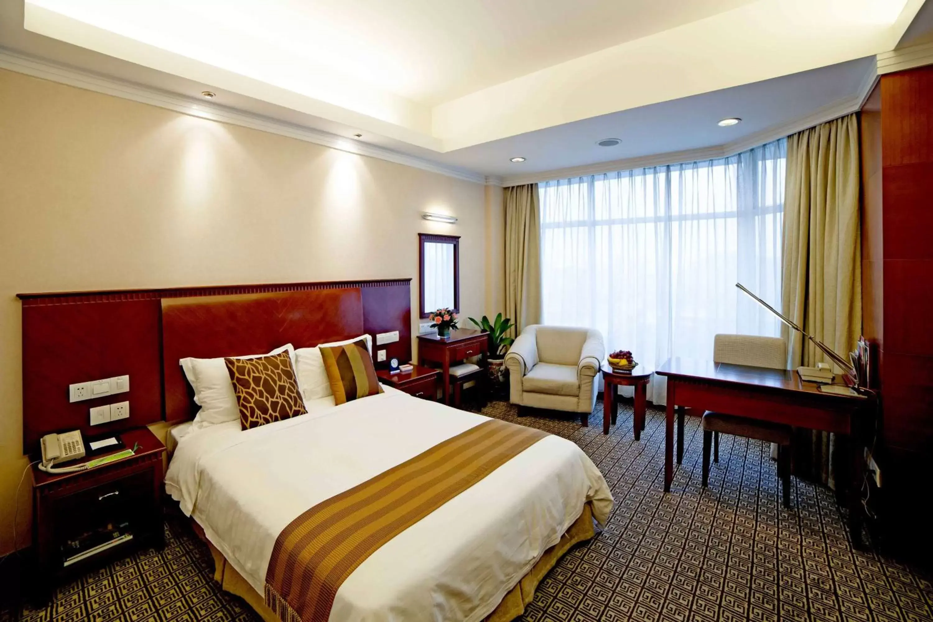 Photo of the whole room, Bed in Ramada by Wyndham Pearl Guangzhou-Canton Fair Free Shuttle Bus