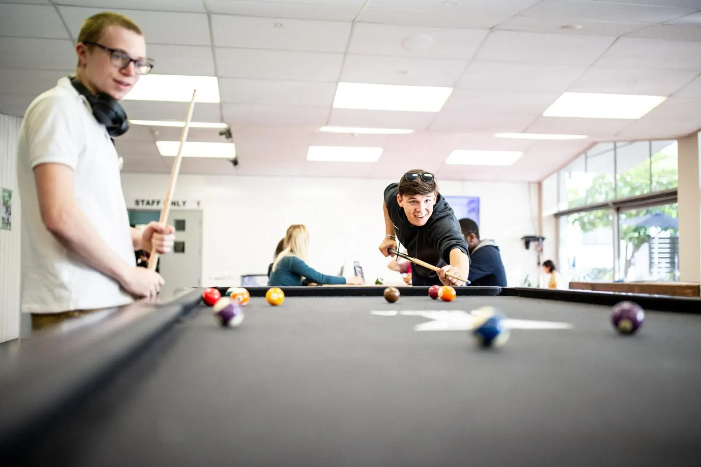 Communal lounge/ TV room, Billiards in YMCA Hostel