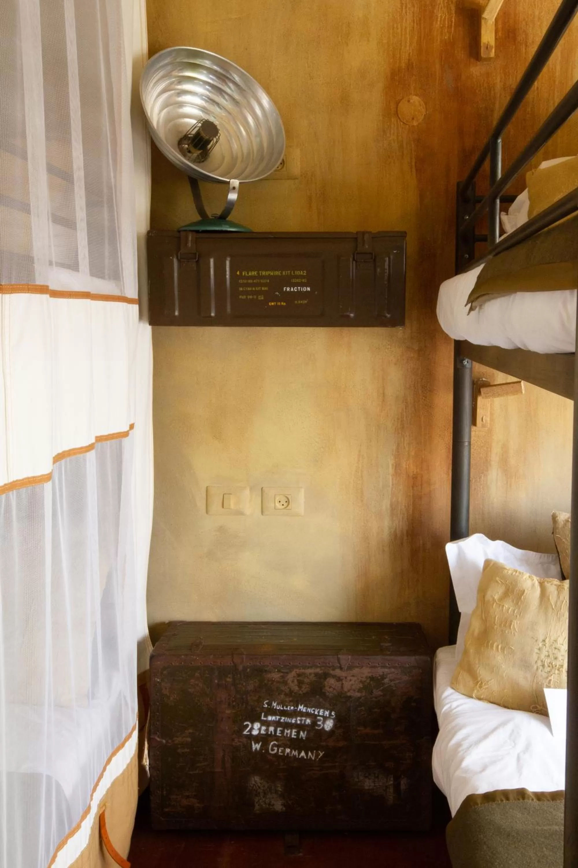 Bed in The Walled Off Hotel