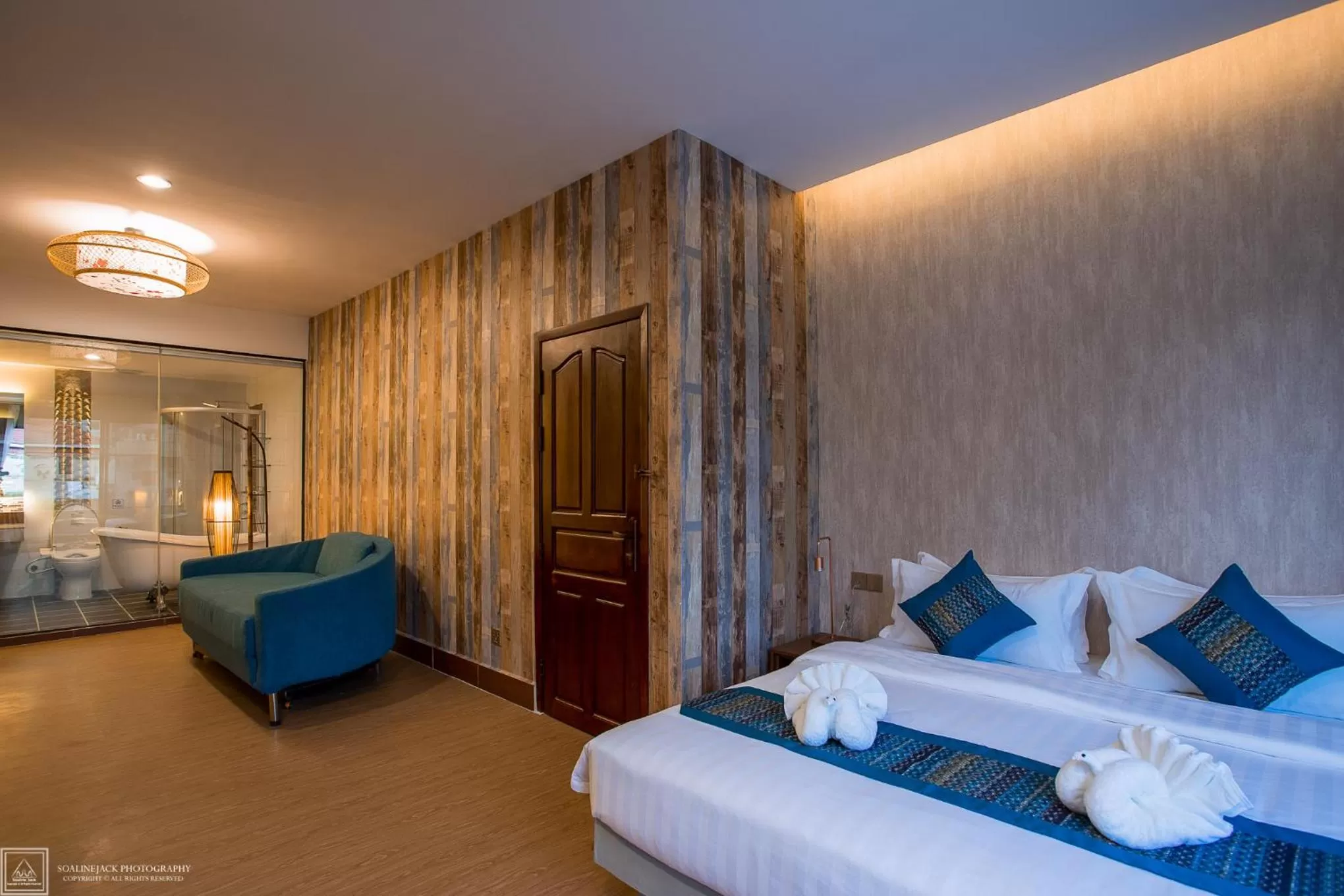 Photo of the whole room, Bed in Orussey One Boutique