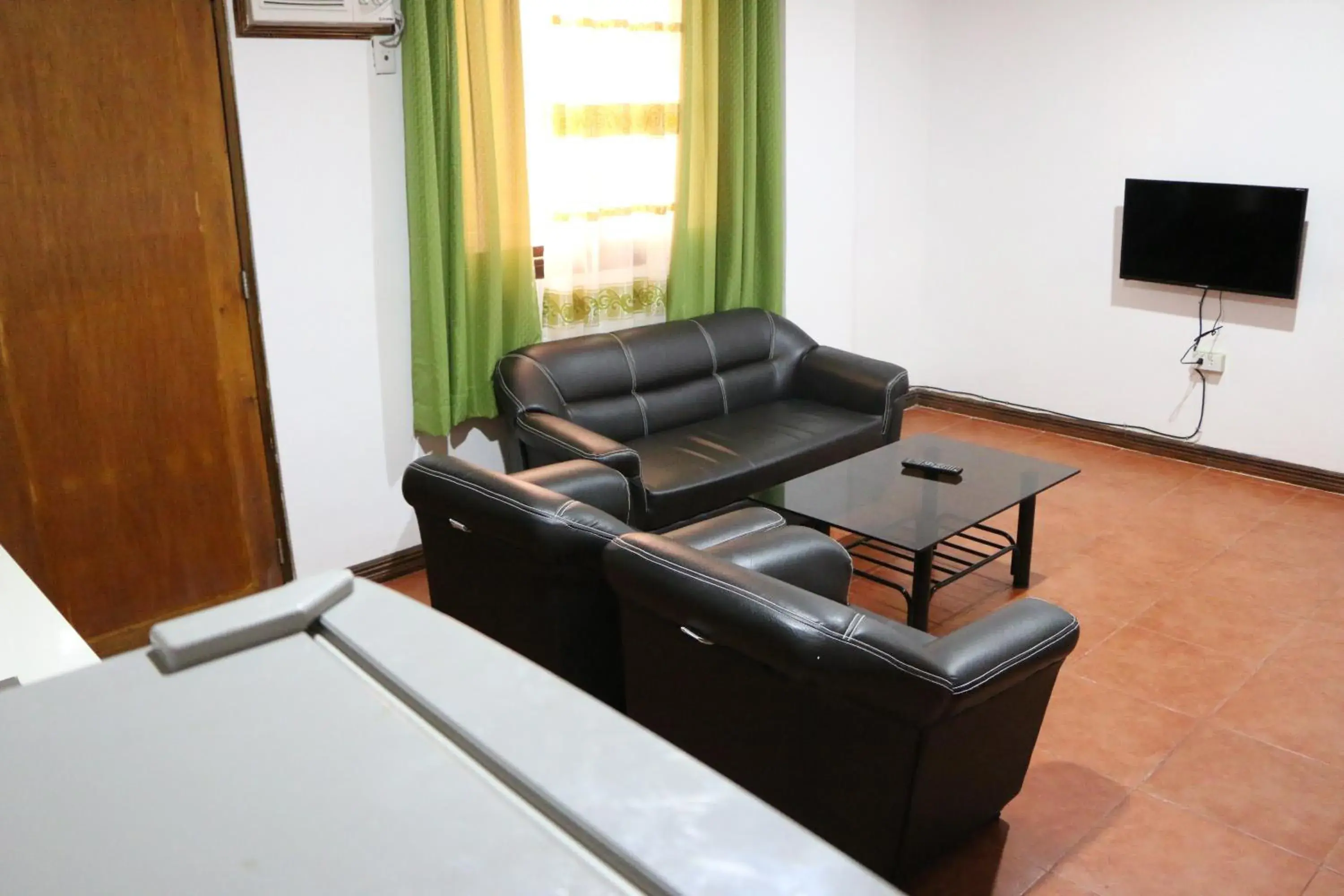 Living room, Seating Area in Badladz Staycation Condos