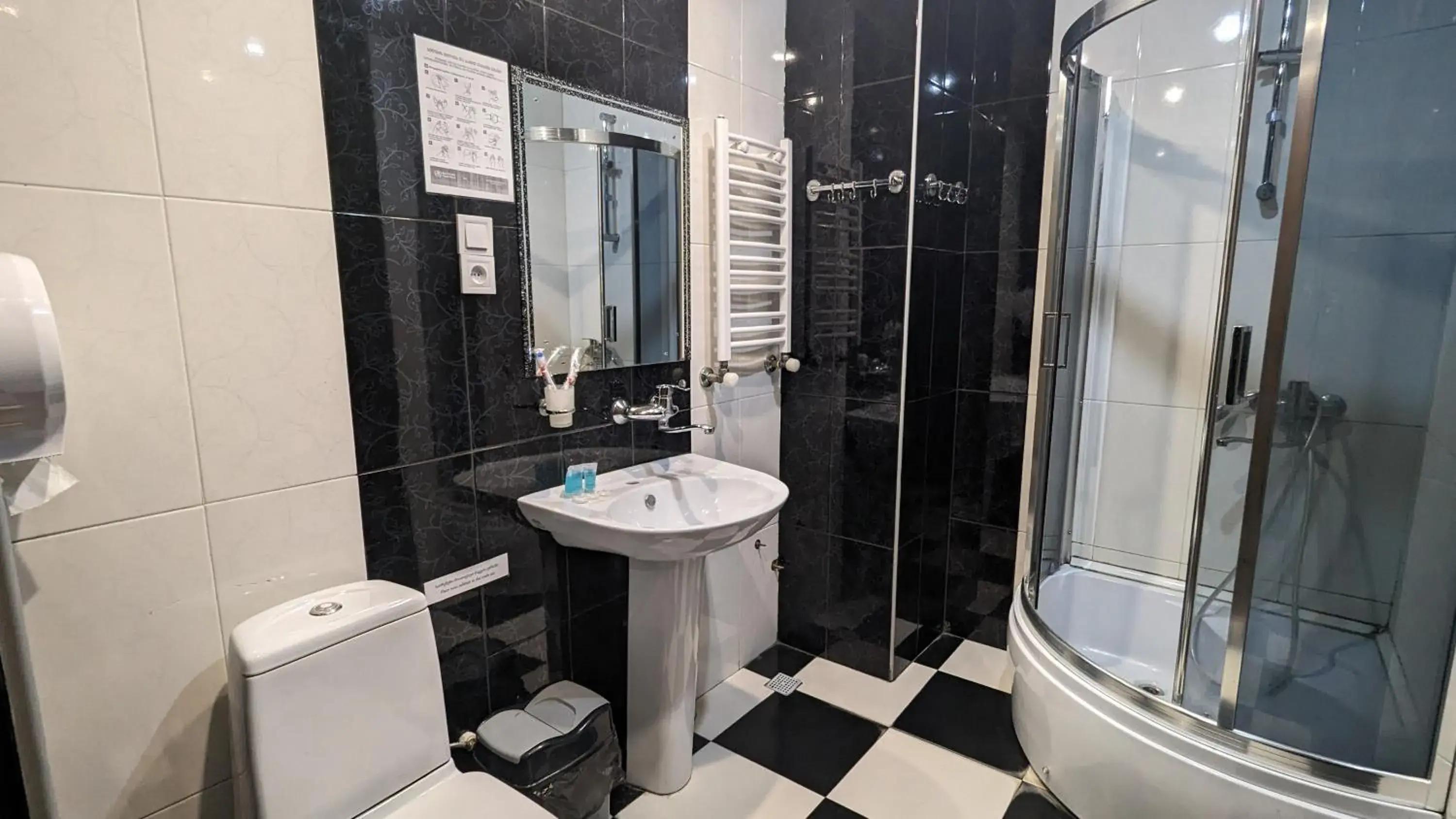 Bathroom in Dkd-bridge Hotel