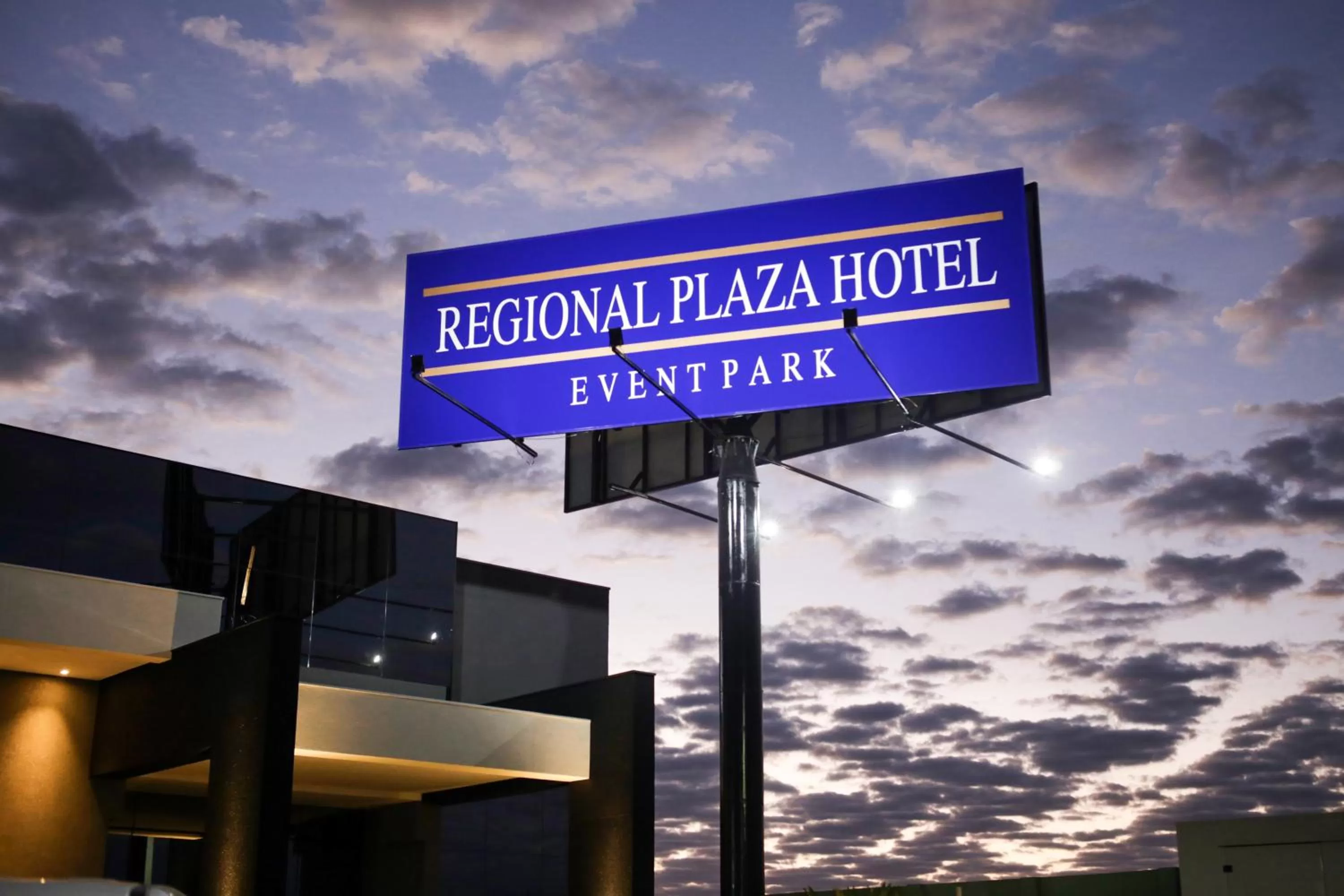 Property logo or sign in Regional Plaza Hotel Event Park