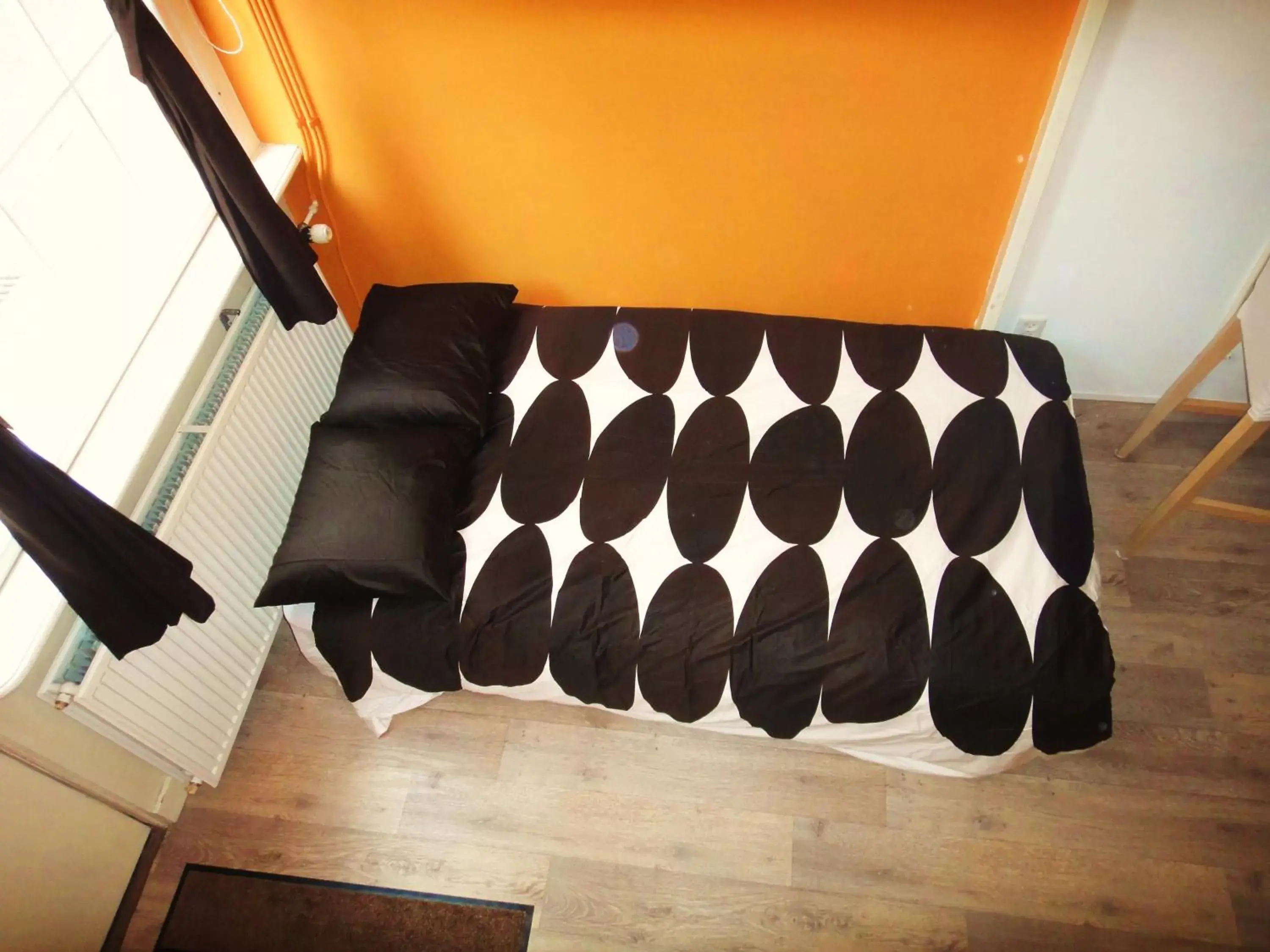 Bed in Orange Suite Studio