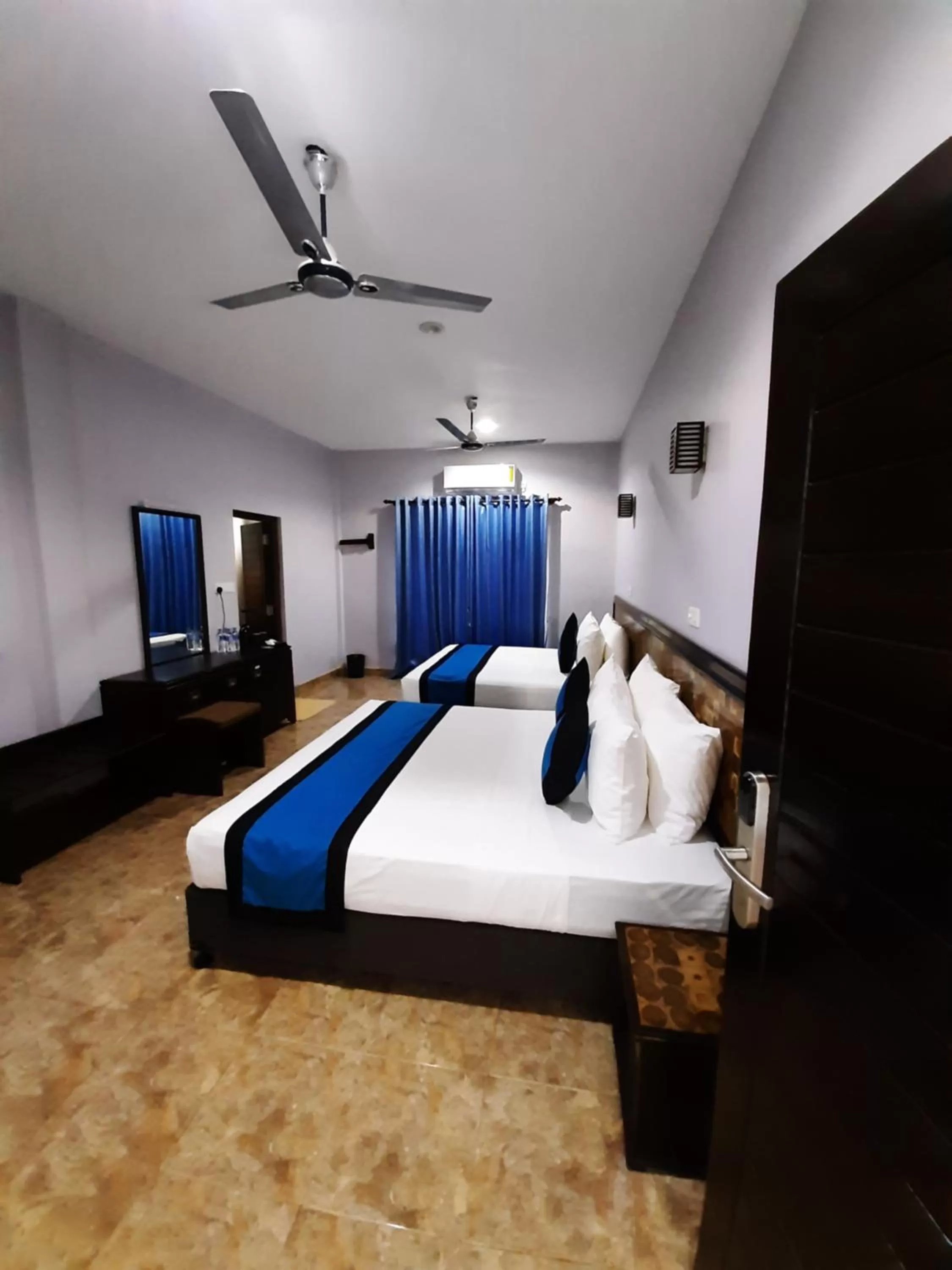 Photo of the whole room, Bed in Blue Sand Beach Resort