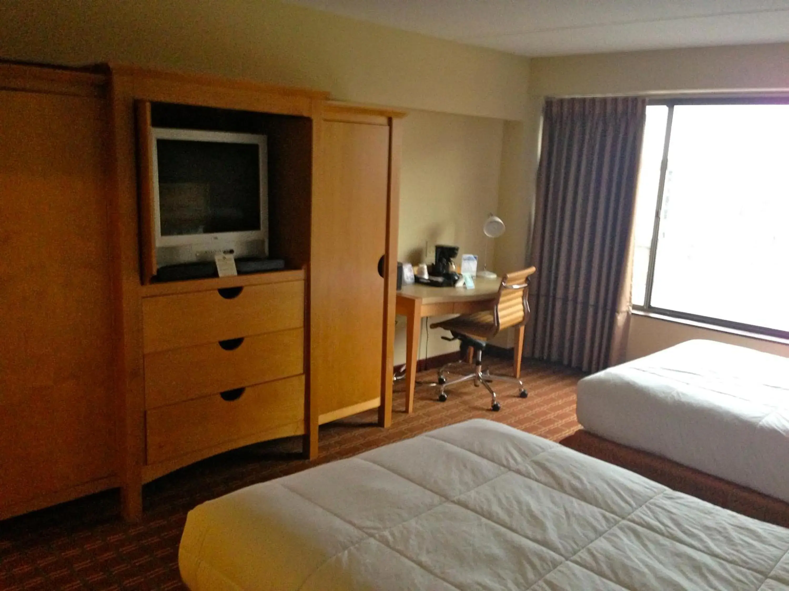 Photo of the whole room, TV/Entertainment Center in The Avalon Hotel and Conference Center
