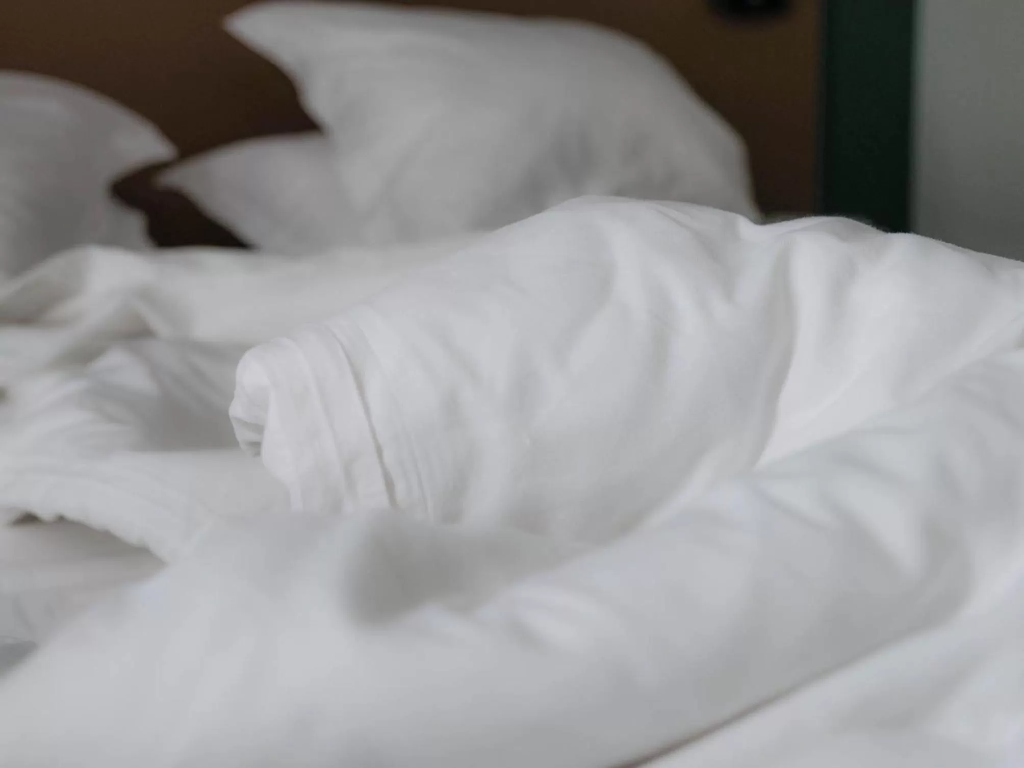 Bed in Logis Hôtel de l'Europe