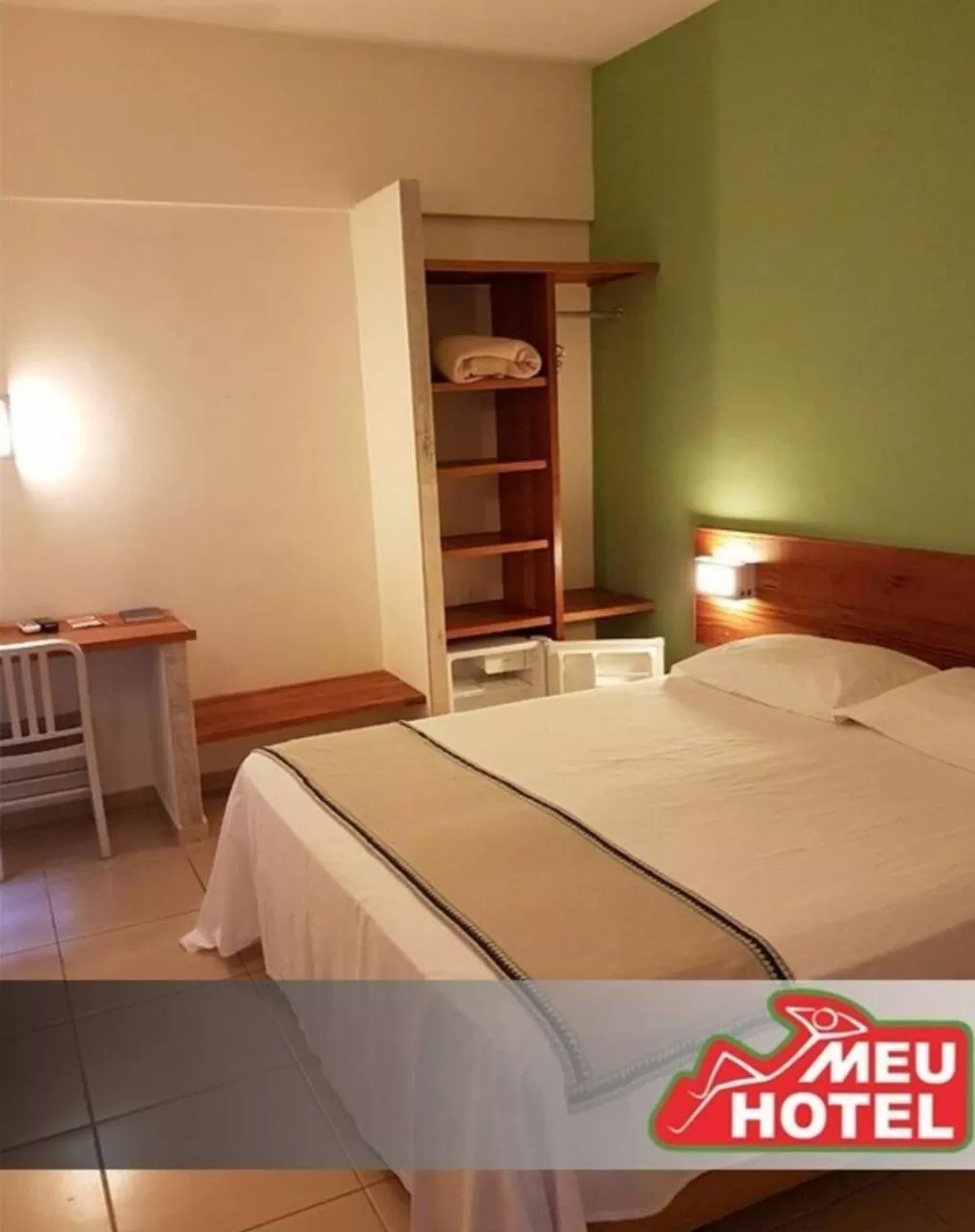 Bed in Meu Hotel Garça