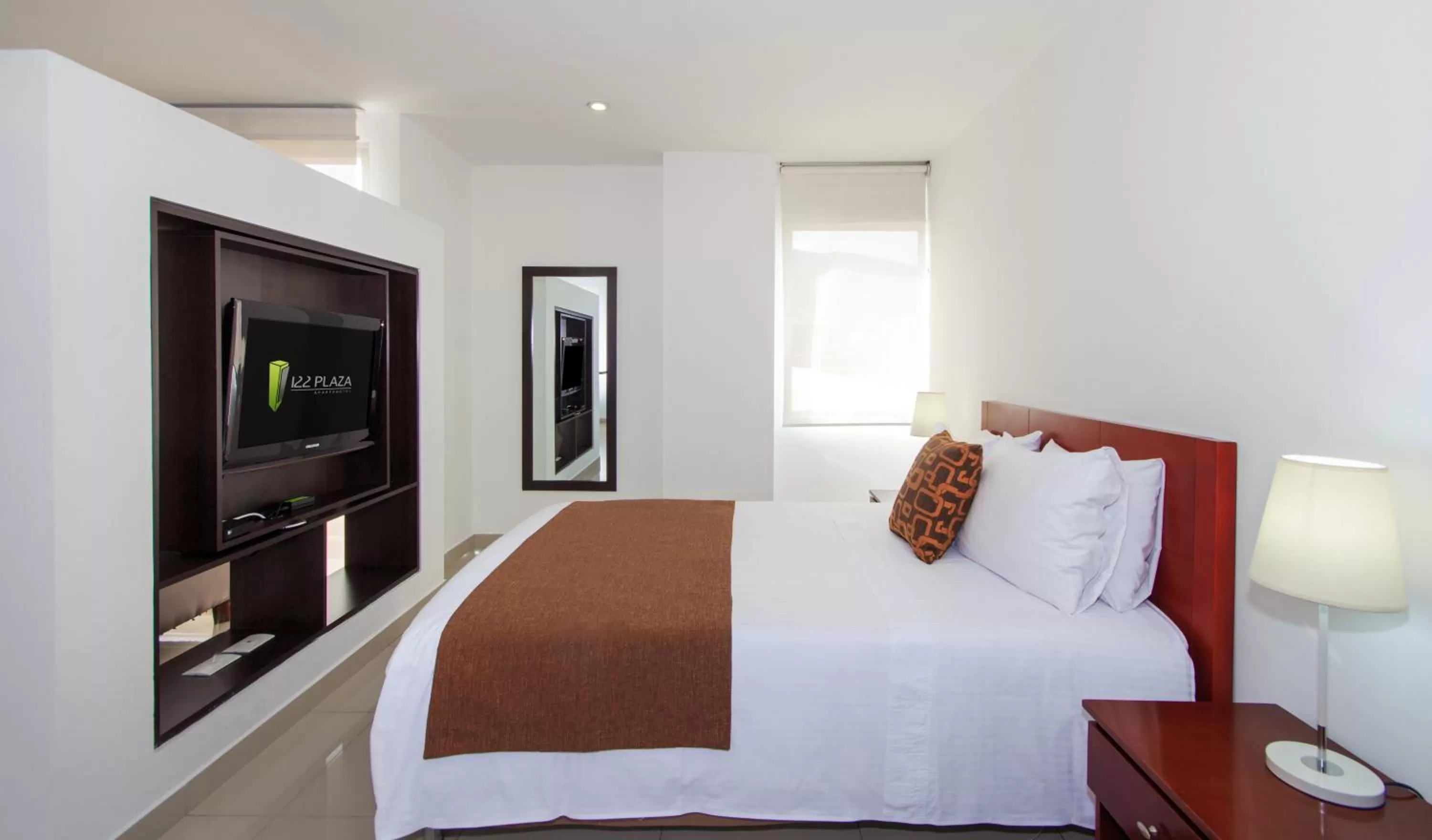 Communal lounge/ TV room, Bed in 122 Plaza Apartahotel