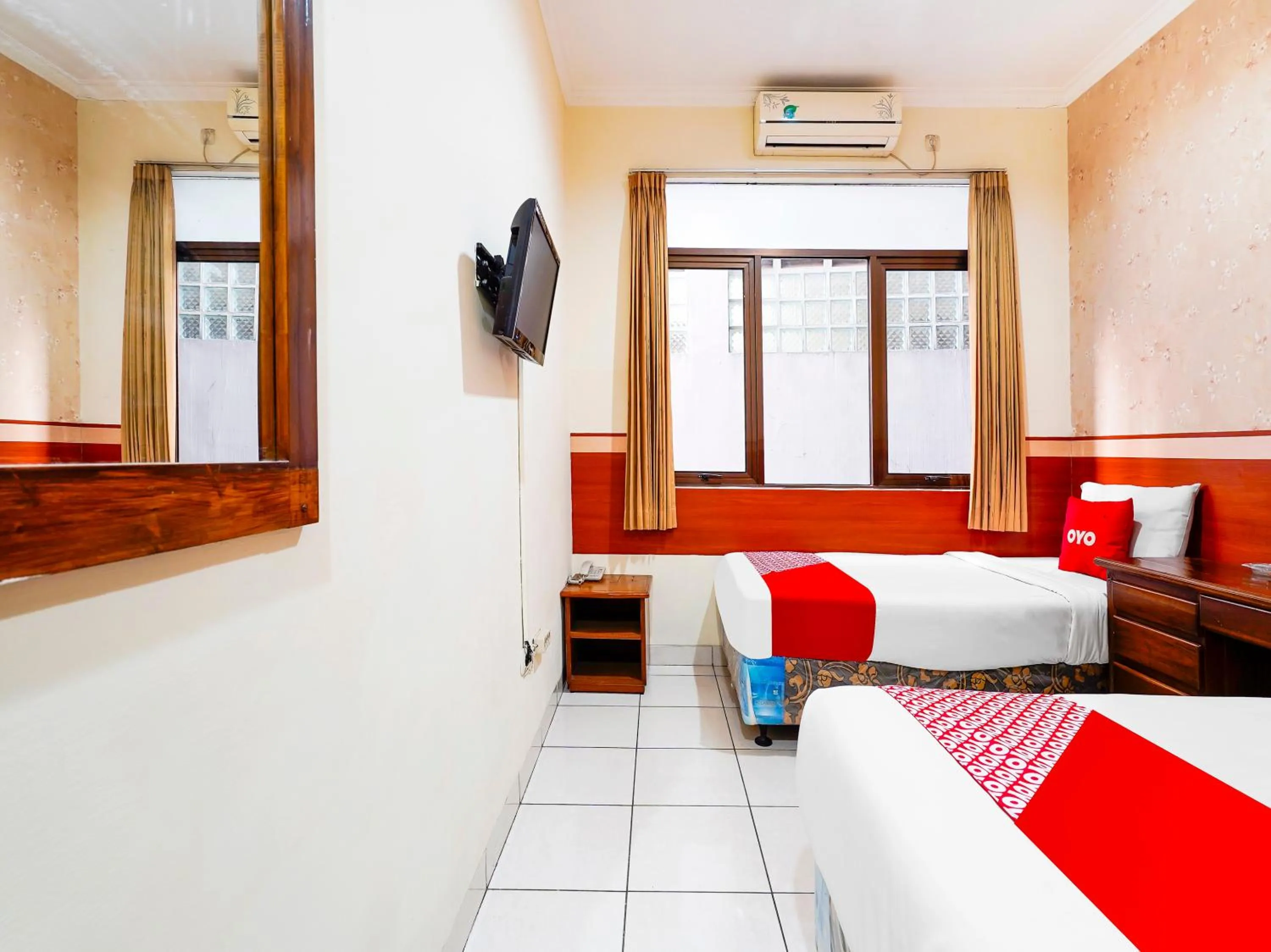 Bedroom in OYO Collection O 91297 Hotel Sakura