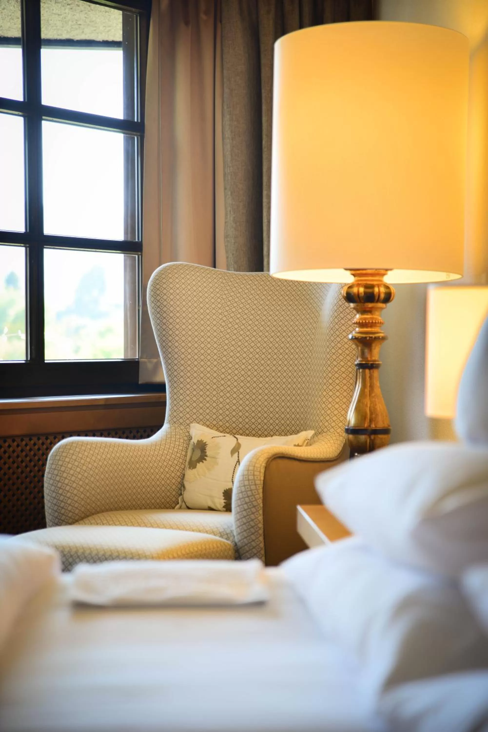 Seating area, Bed in Parkhotel Oberstaufen