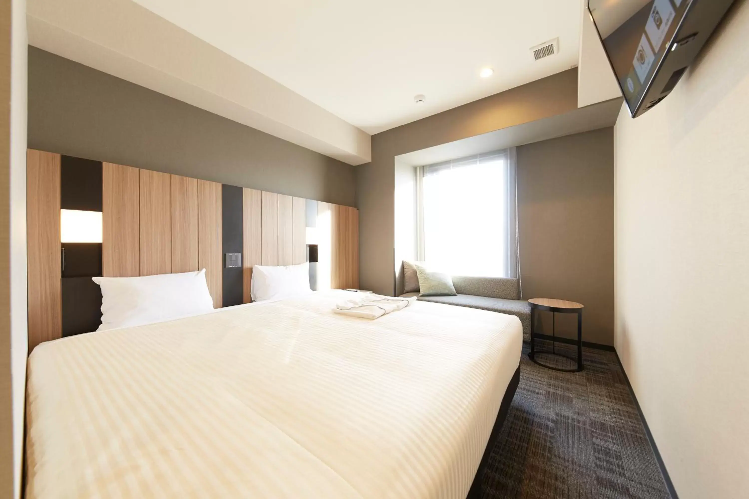 Photo of the whole room, Bed in hotel MONday Kyoto Karasuma Nijo