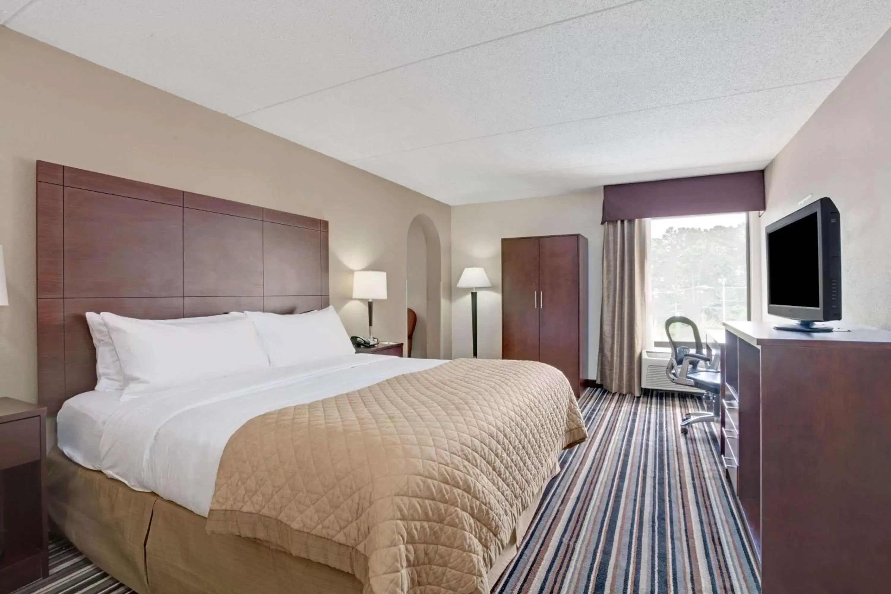 Photo of the whole room, Bed in Wyndham Garden Charlotte Airport Southeast