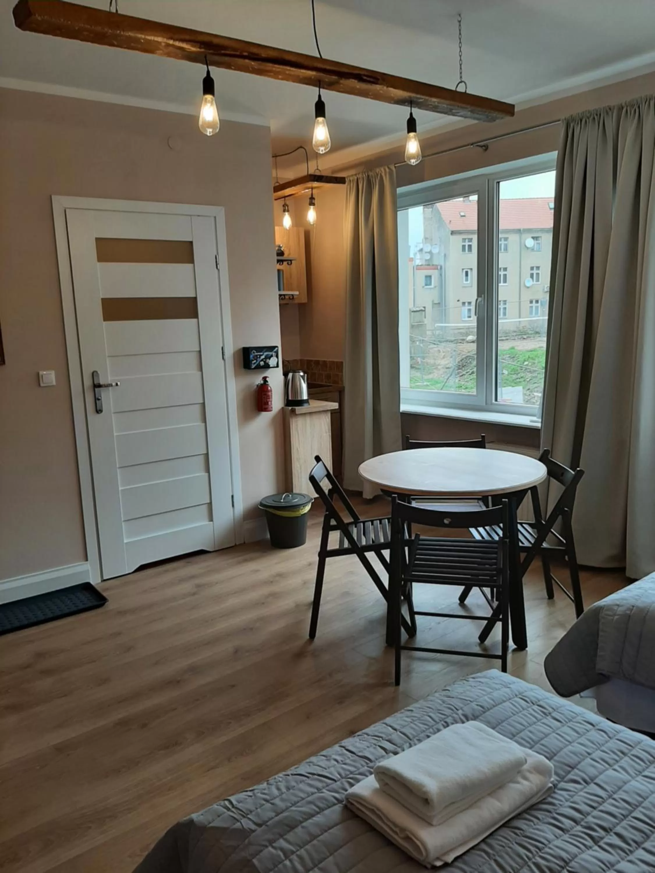 Seating area, Bed in Drzewna Apartamenty - Kupiecka 5