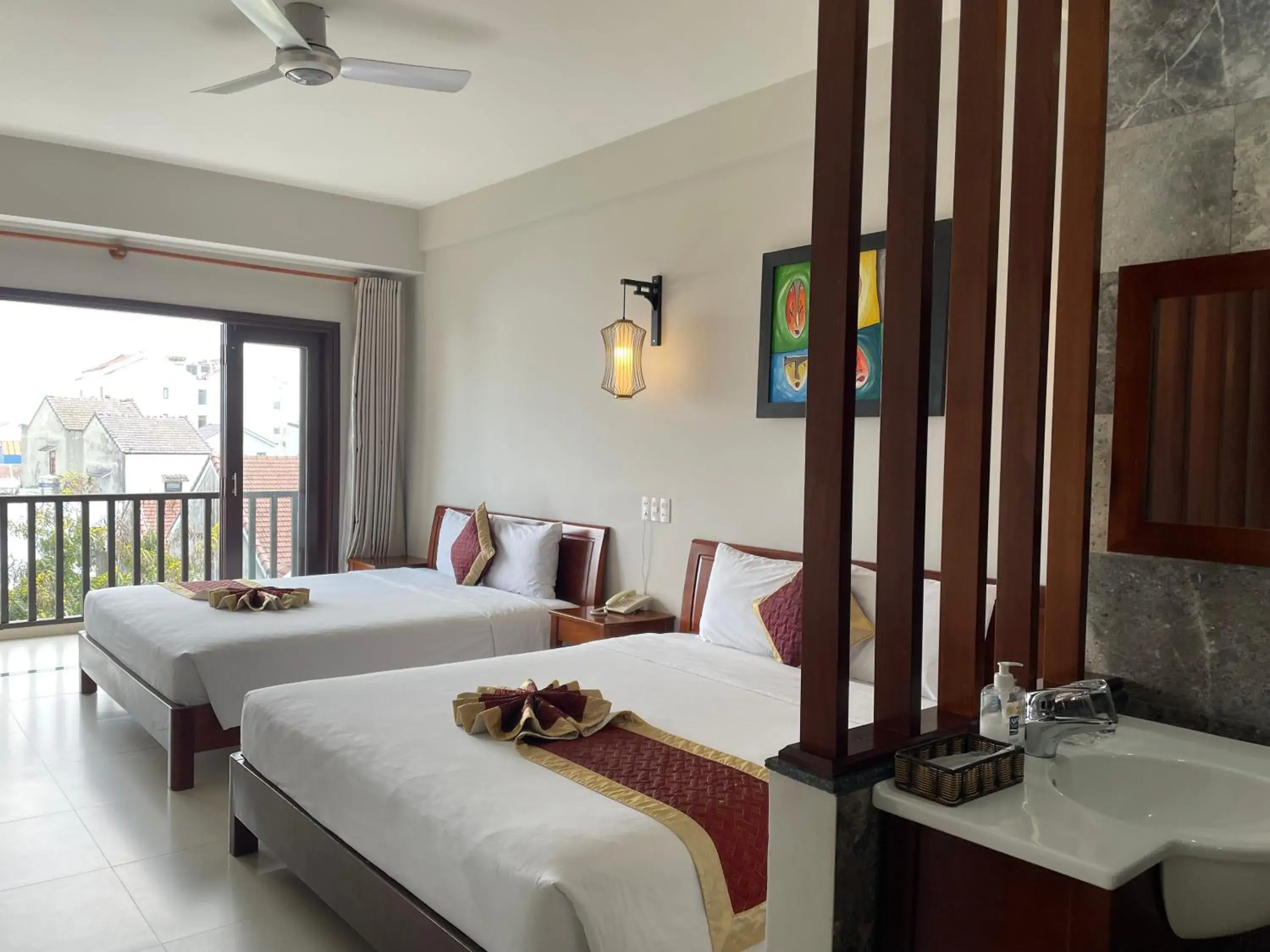 Deluxe Family Room with Balcony in Sunshine Hoian Hotel Deluxe Family Room with Balcony in Sunshine Hoian Hotel