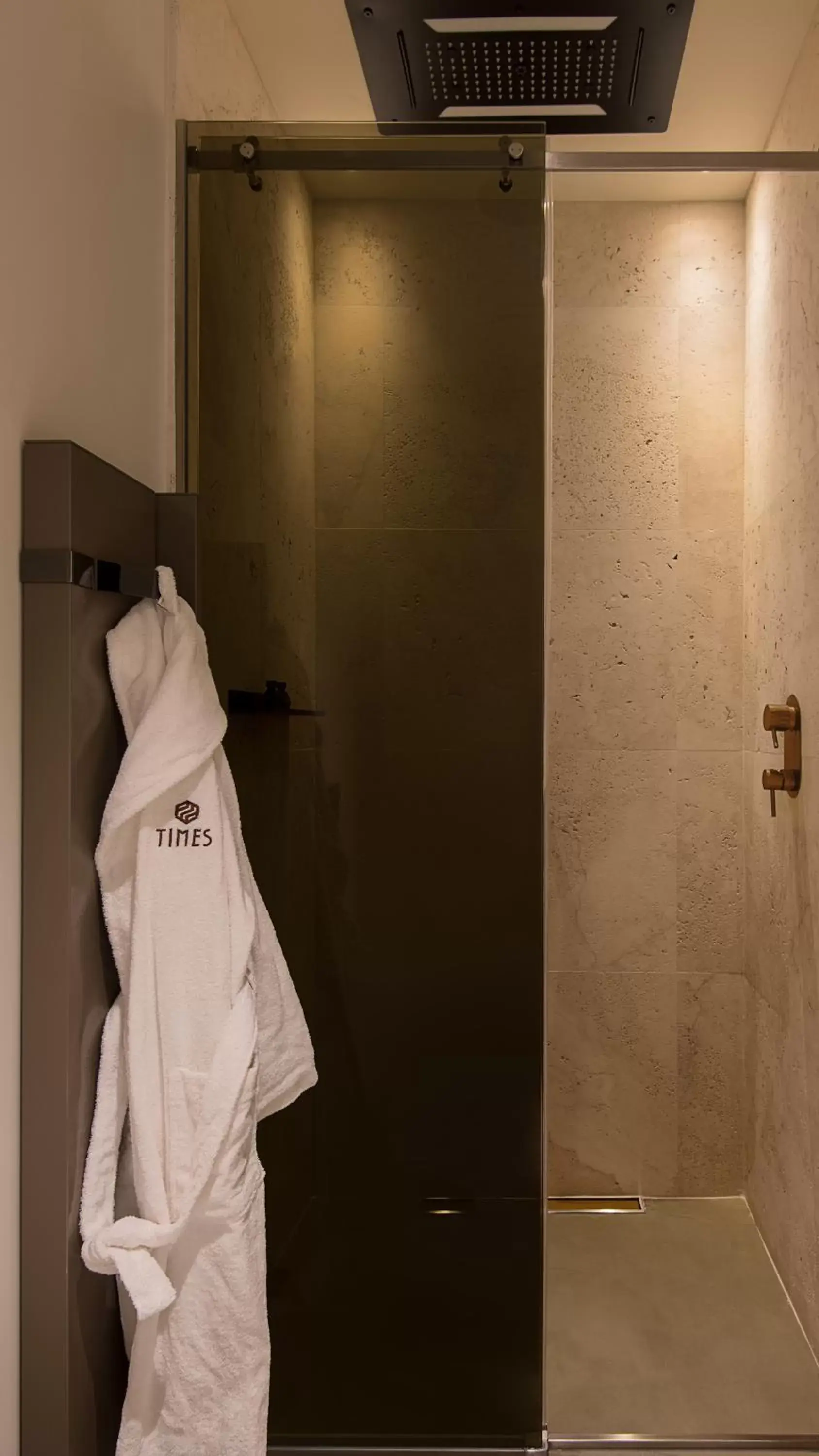 Shower, Bathroom in Times Suites