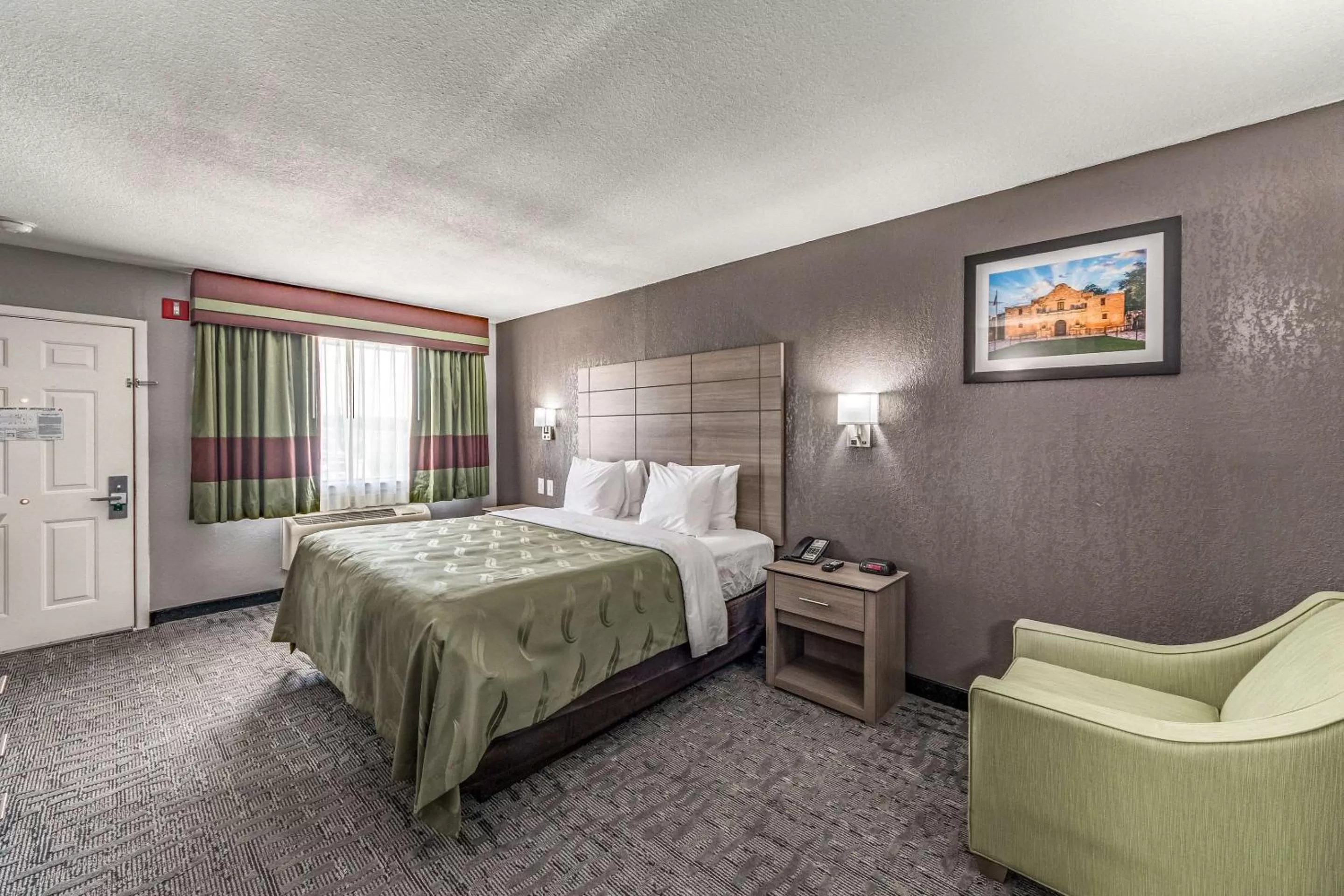 Photo of the whole room, Bed in Quality Inn I-10 East near Frost Bank Center