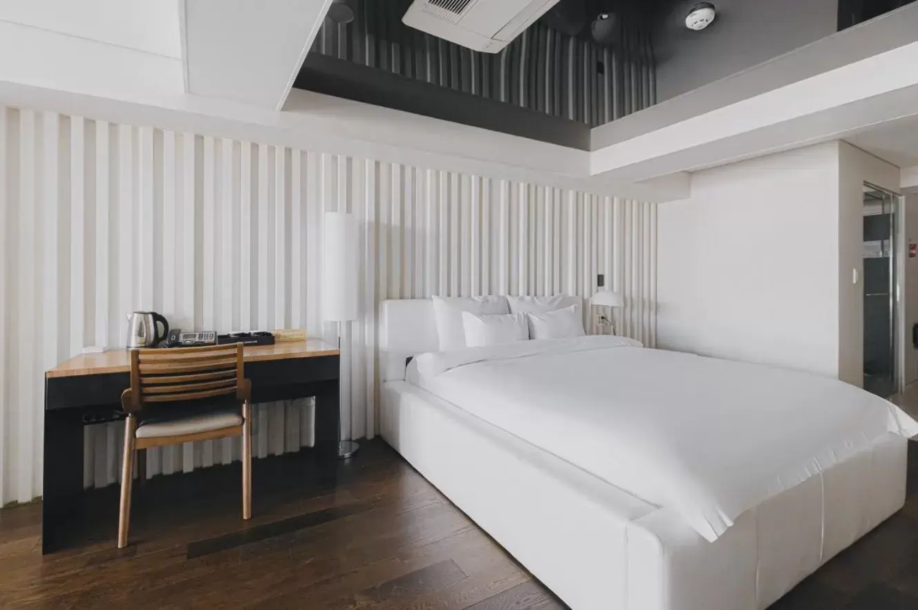 Bed in ACC Design Hotel