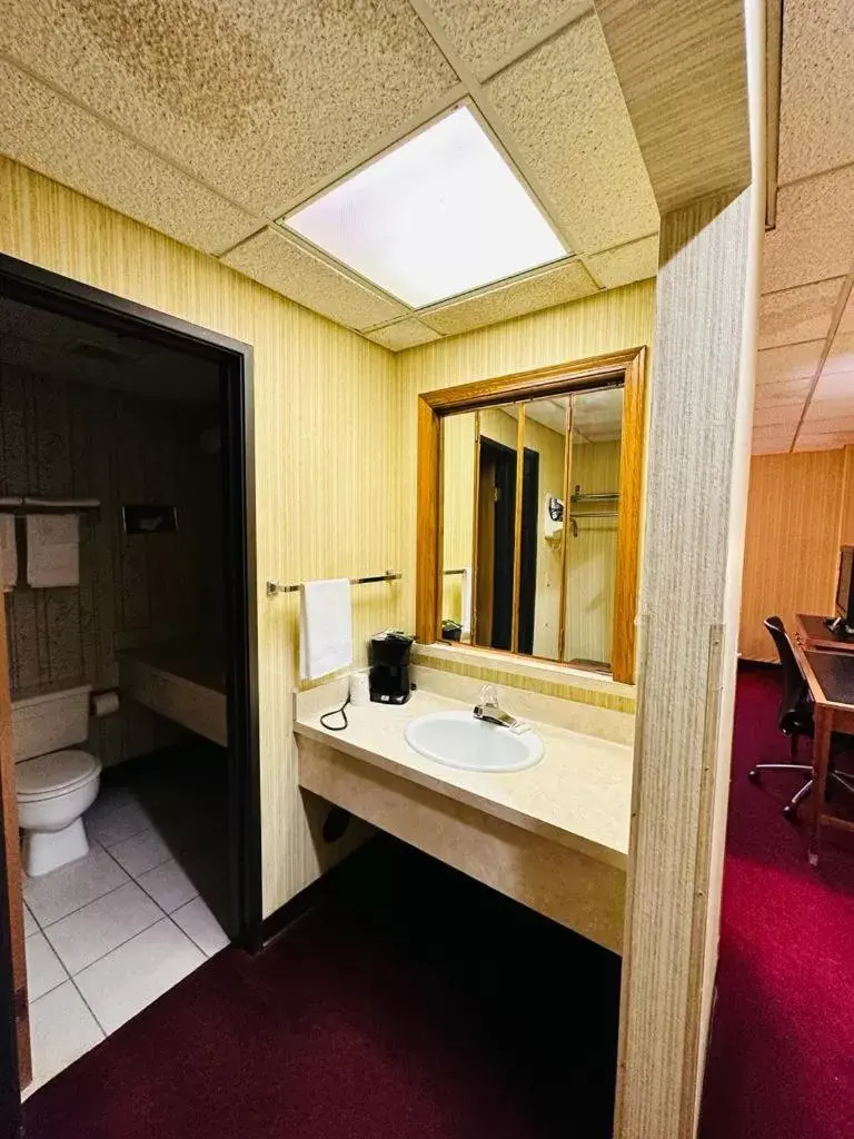 Bathroom in Travel Inn & Suites