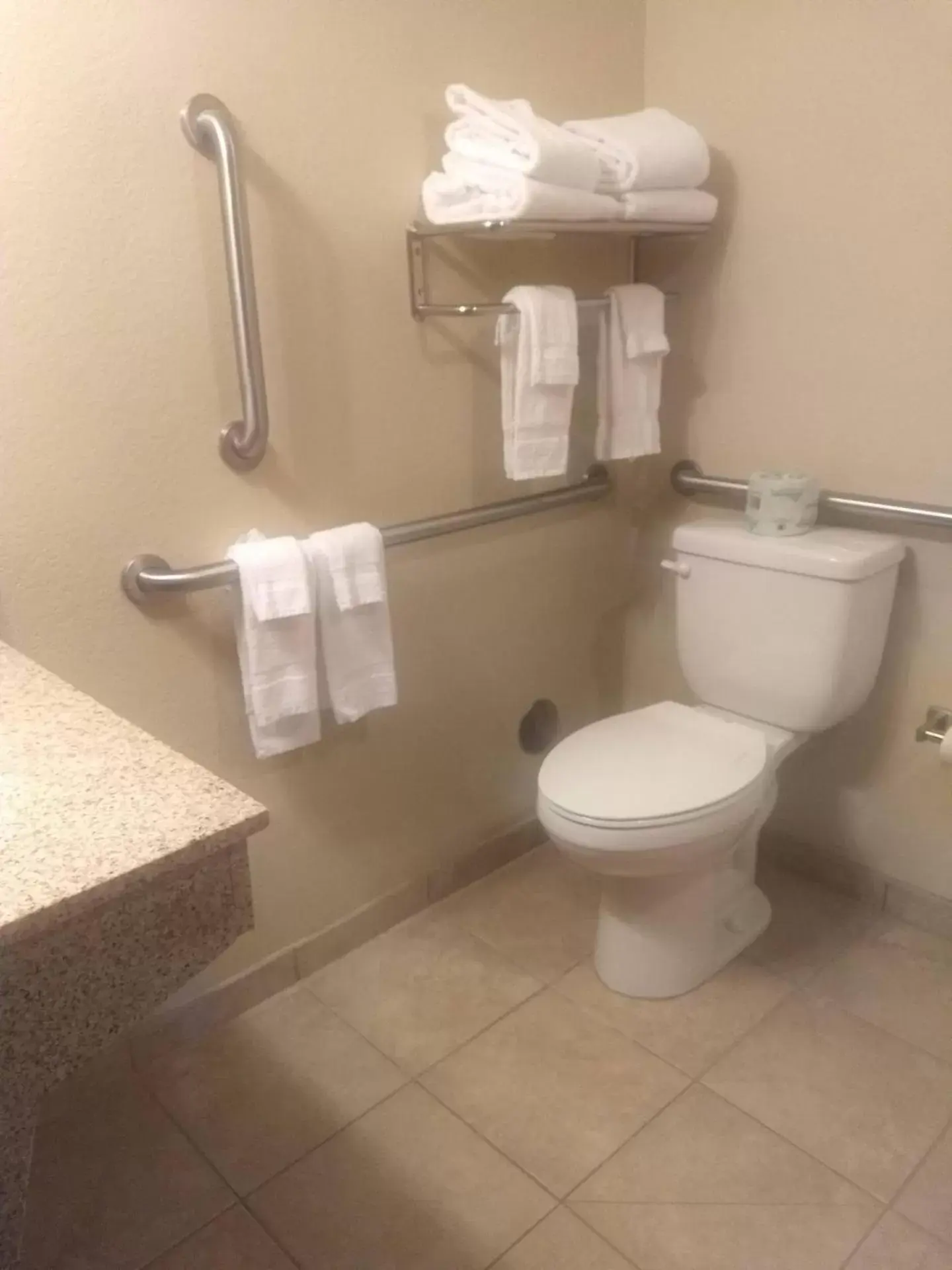 Toilet, Bathroom in Cobblestone Hotel and Suites - Crookston