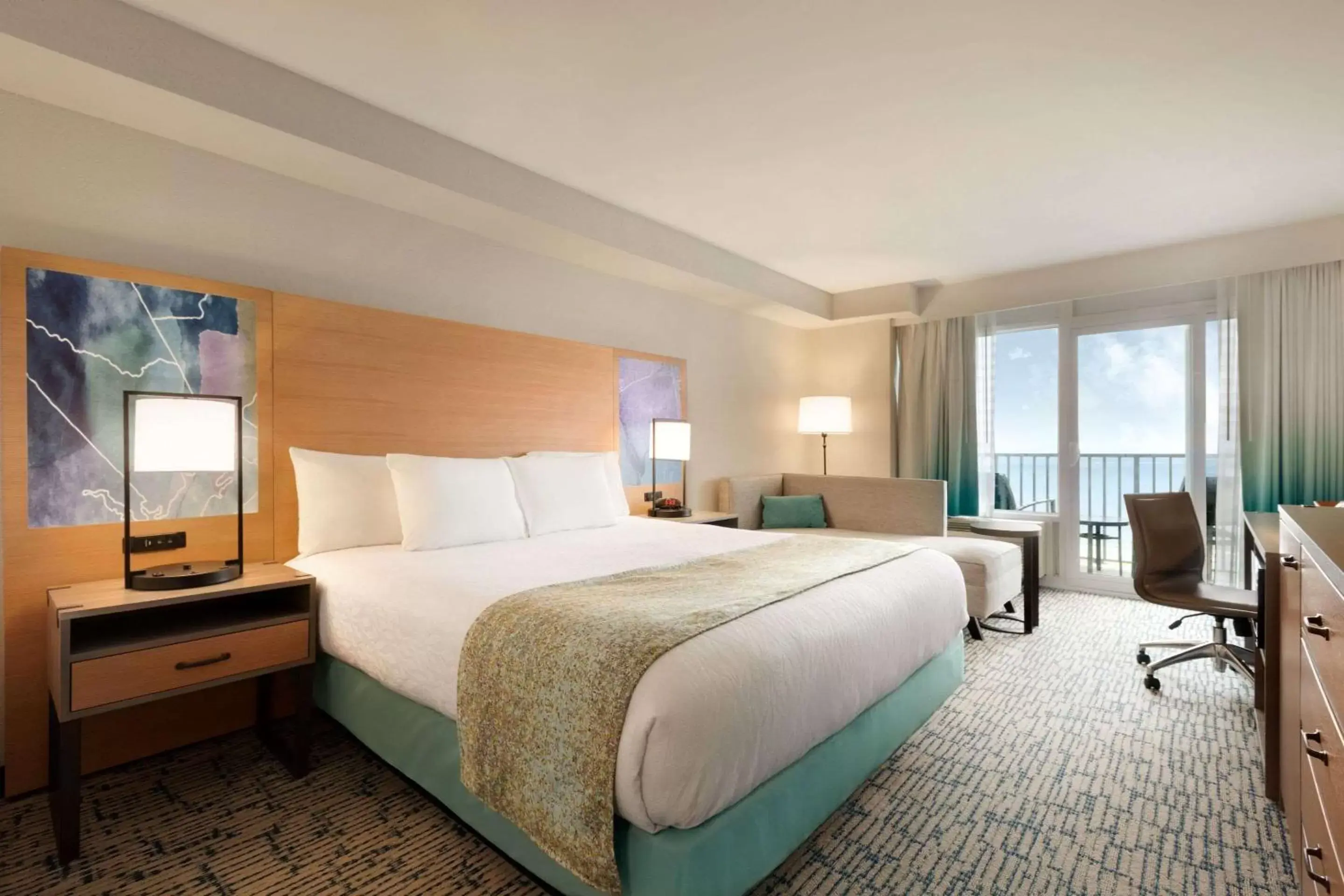 Bedroom, Bed in Surfbreak Oceanfront Hotel, Ascend Hotel Collection