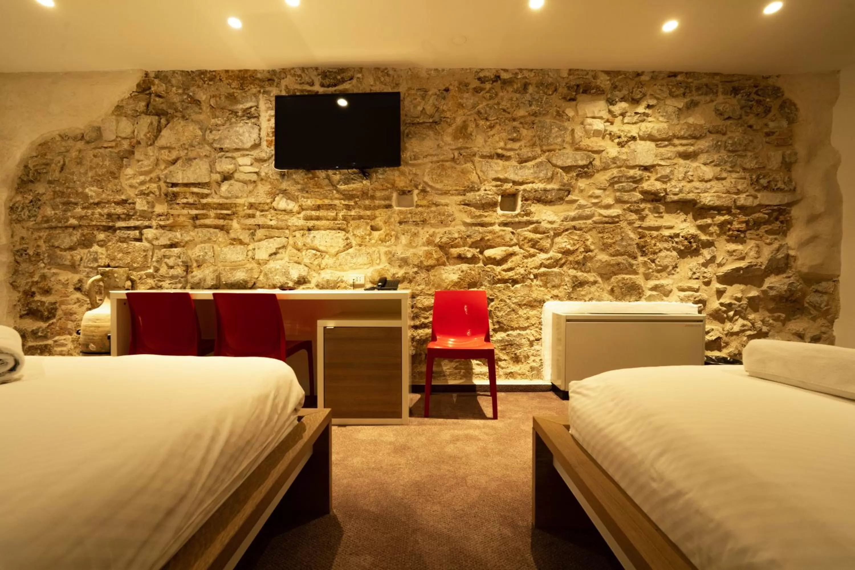 Bed in Slavija Culture Heritage Hotel