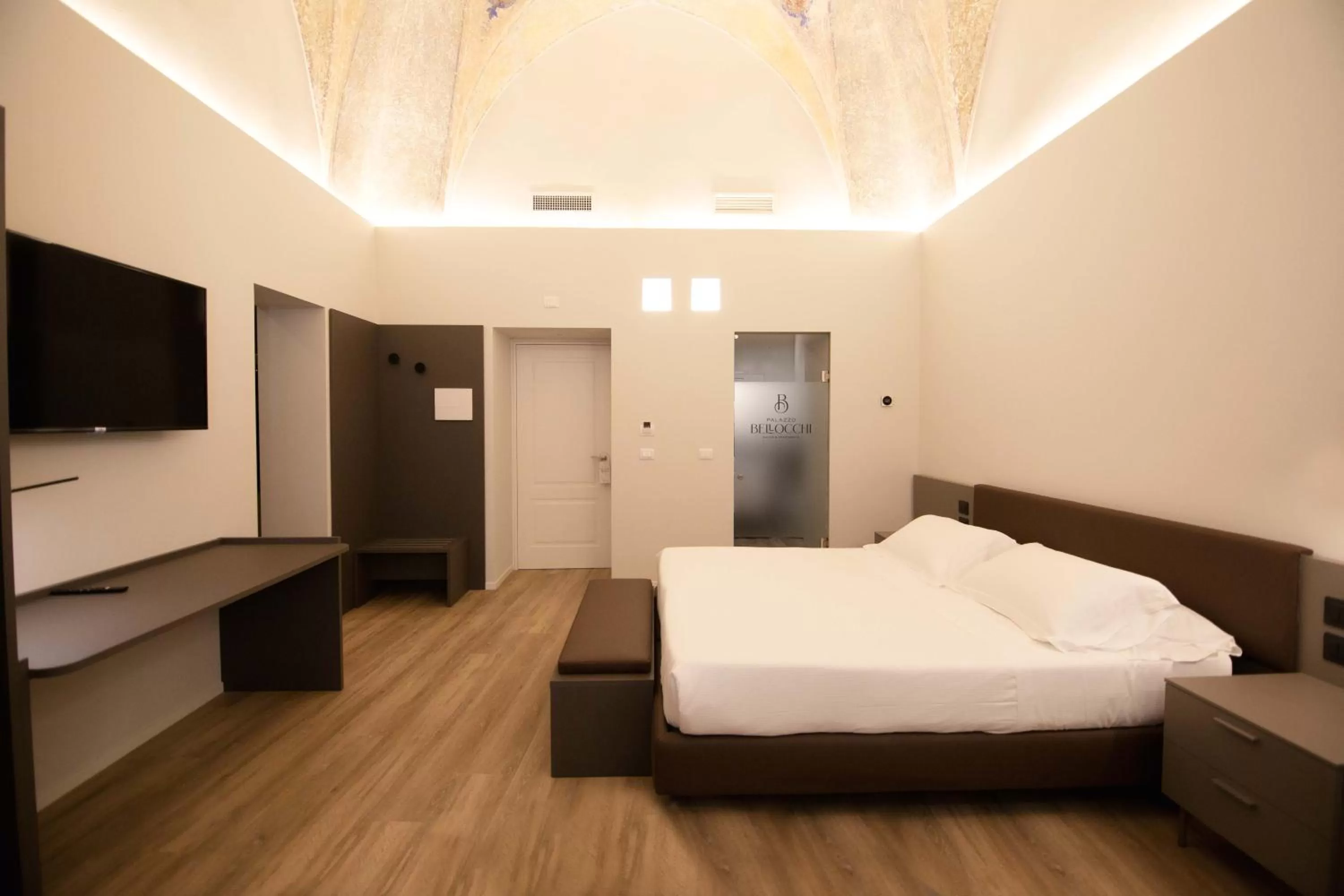 Photo of the whole room, Bed in Palazzo Bellocchi - Suites & Apartments