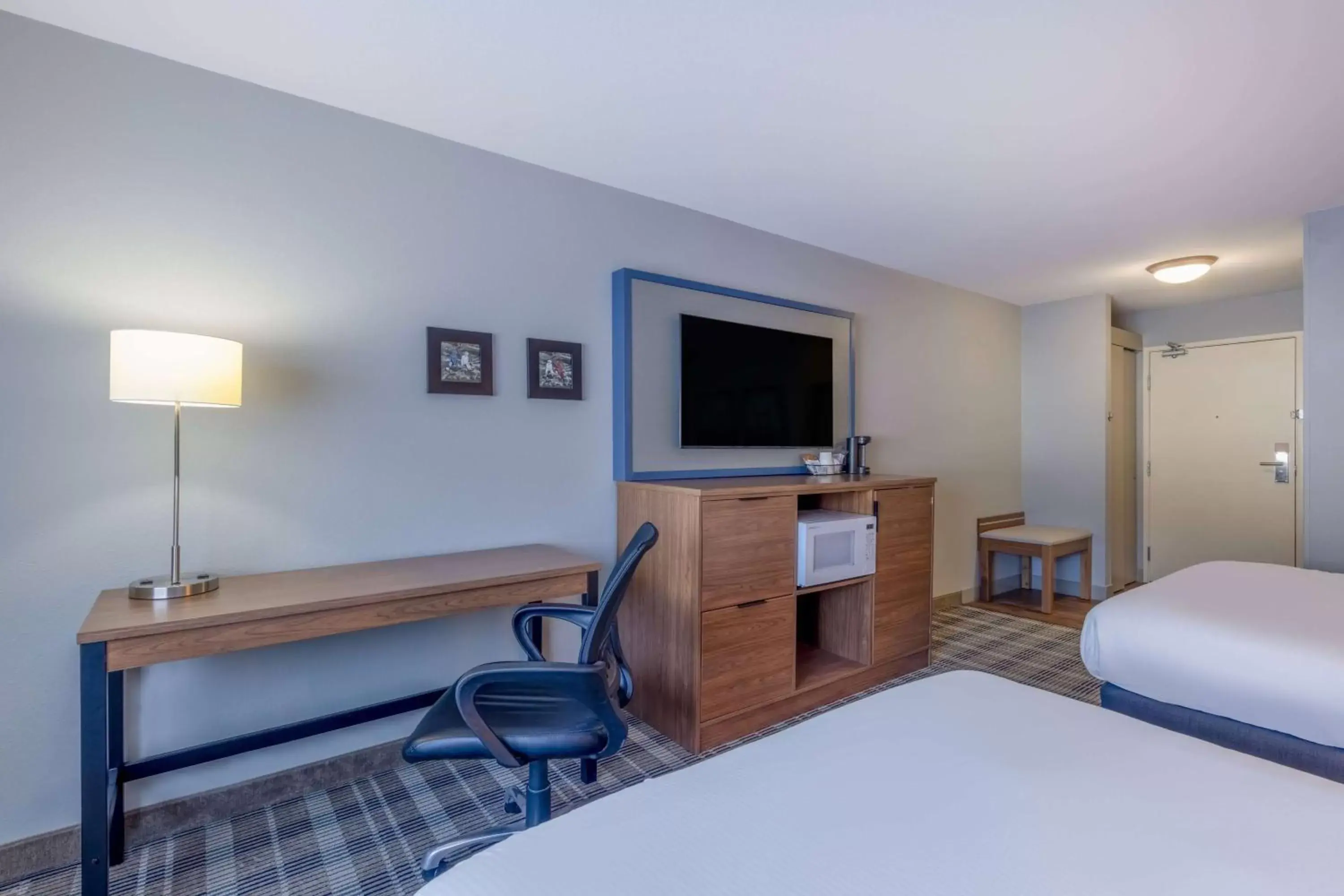 Photo of the whole room, TV/Entertainment Center in AmericInn by Wyndham Duluth