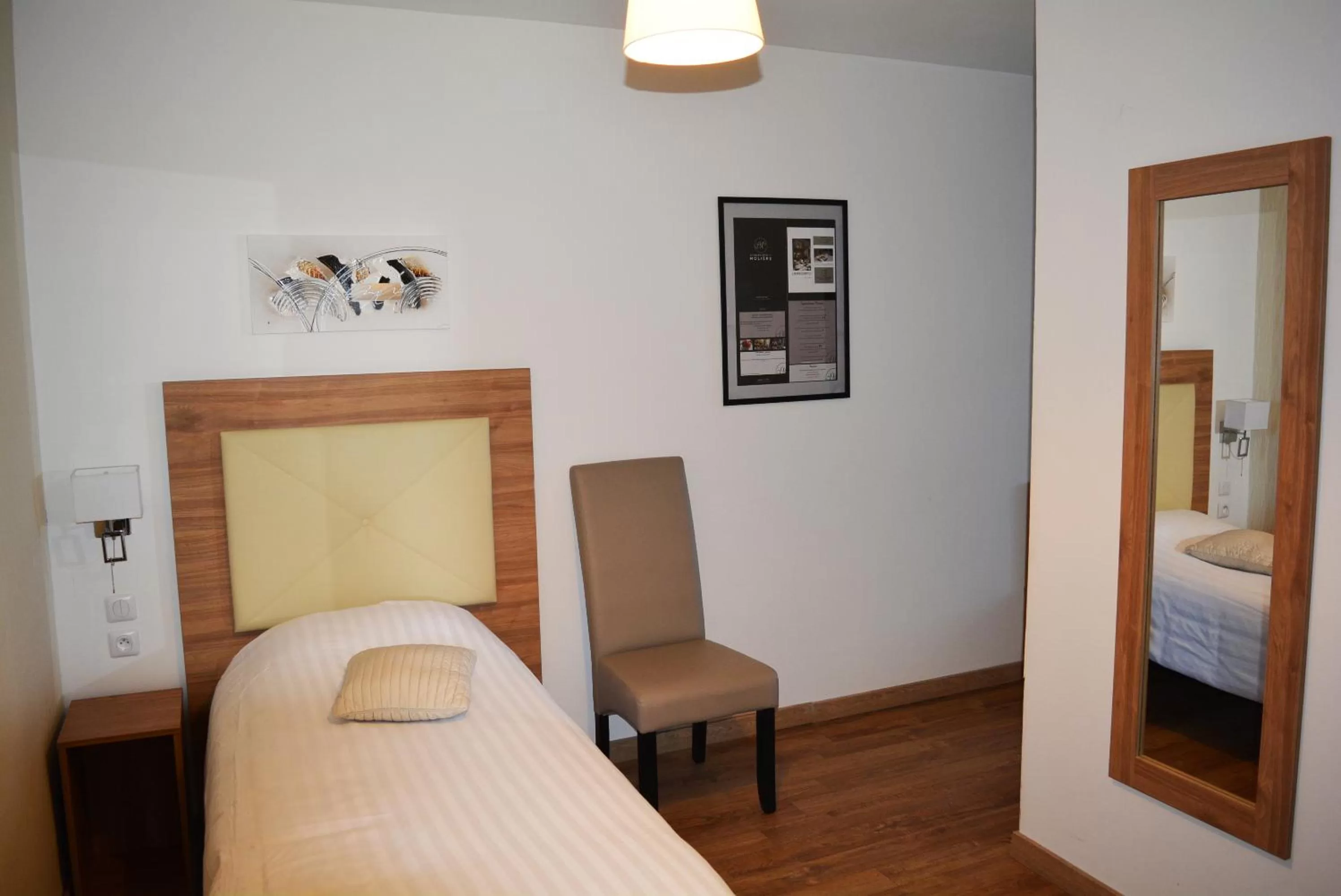 Bed in Le Grand Hôtel Molière