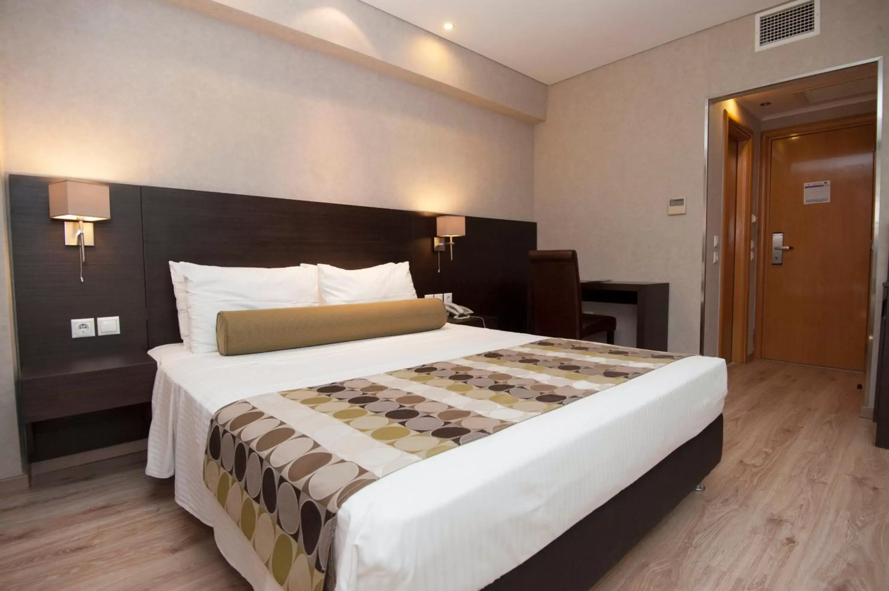 Bed in Nefeli Hotel Alimos