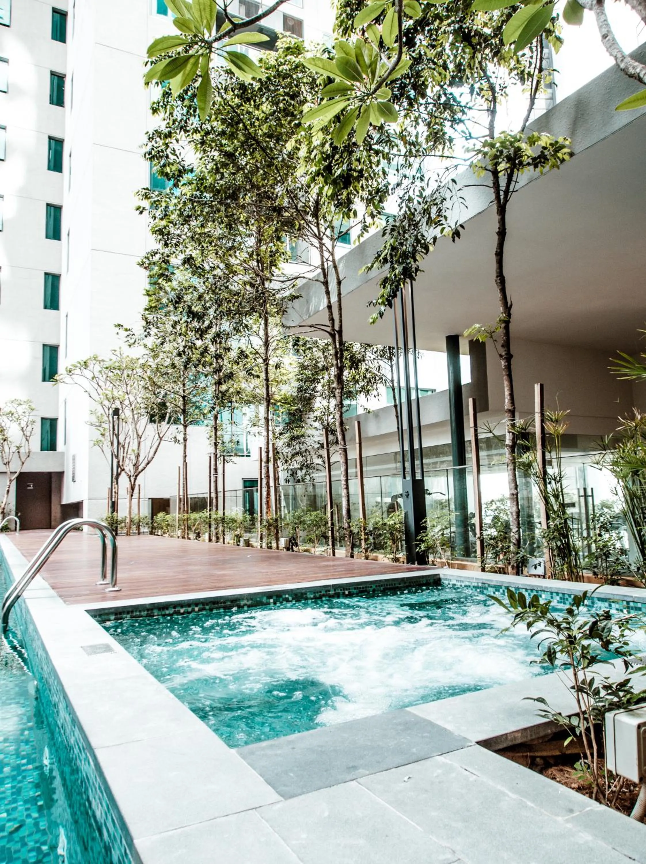 Swimming pool in Summer Suites Residences by Subhome