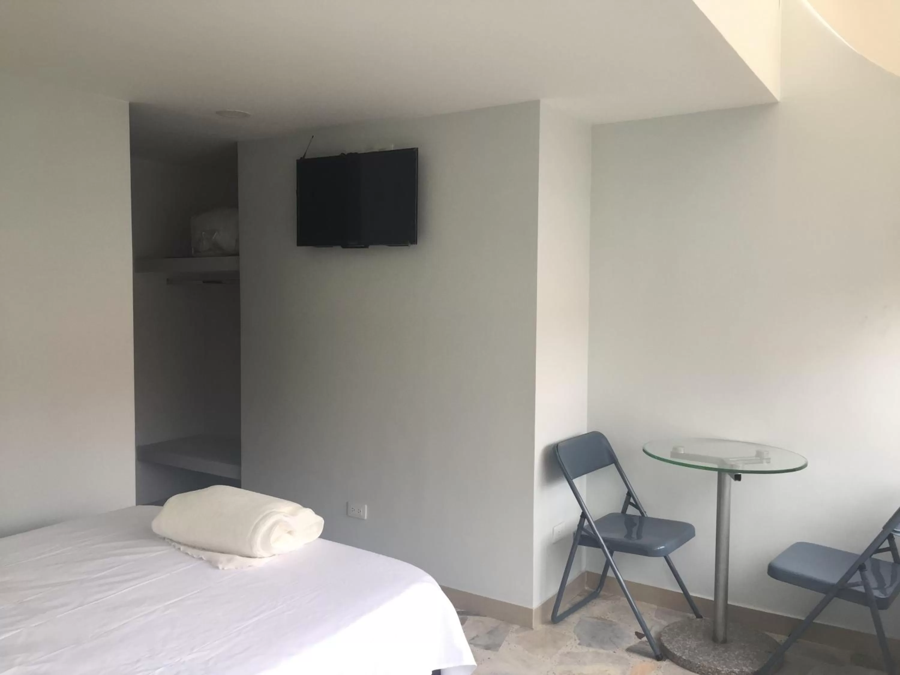 Bed in Hotel Garden City Boutique