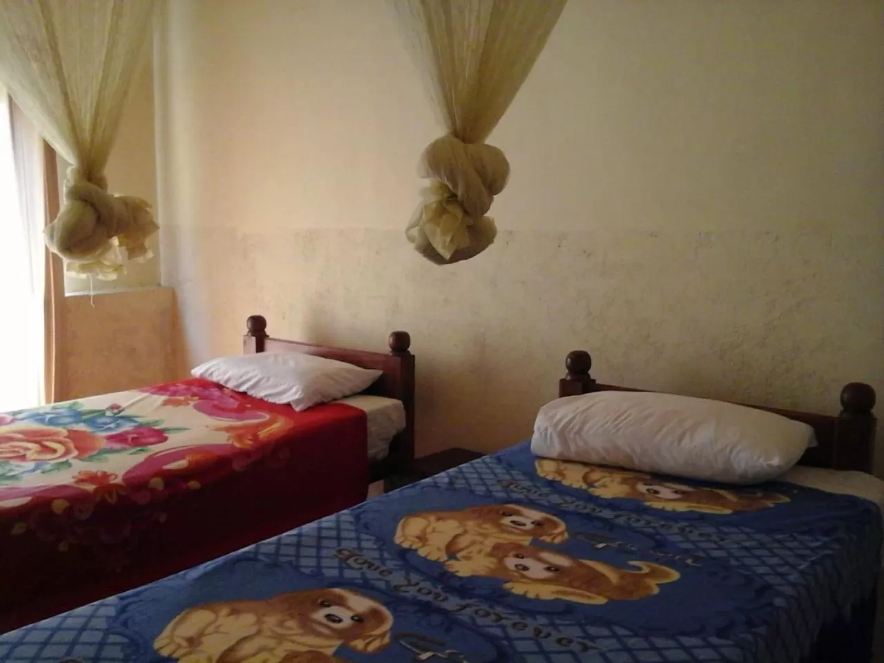 Bed in Majestic Tourist Hotel