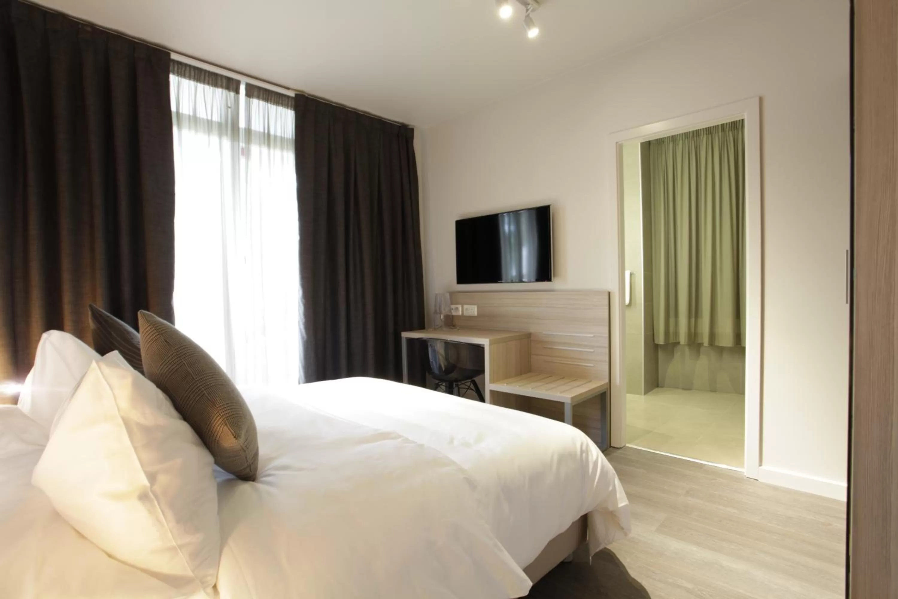 Bed in Chez Maman Hotel & Restaurant